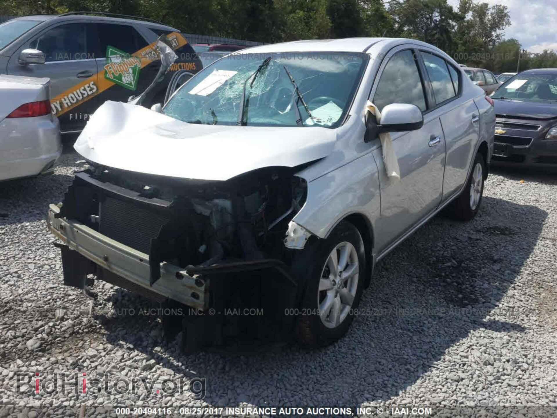 2014 Nissan Versa - VIN: 3N1CN7AP2EL877024 - Фото 2