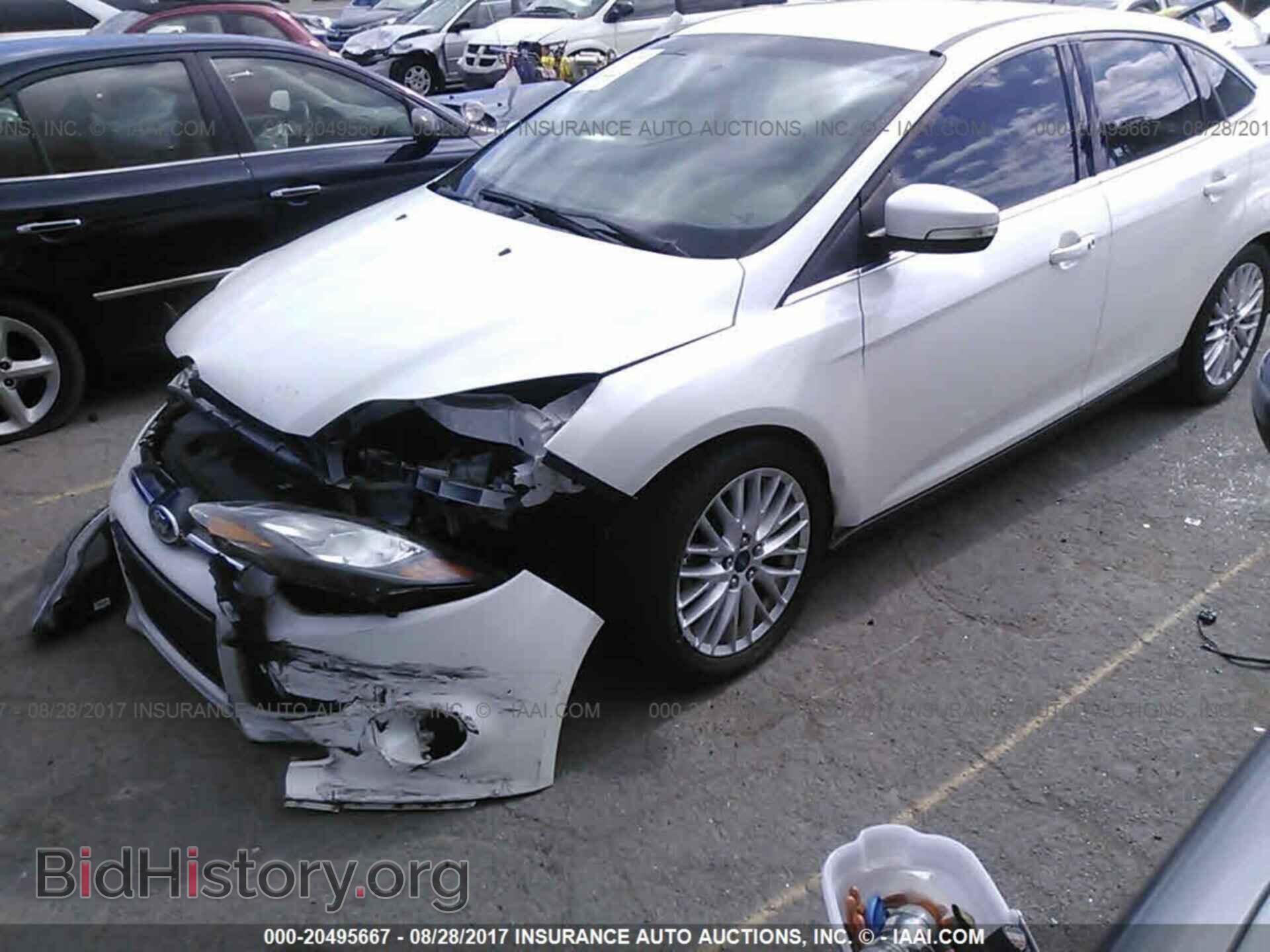 2014 Ford Focus - VIN: 1FADP3J2XEL185863 - Фото 2