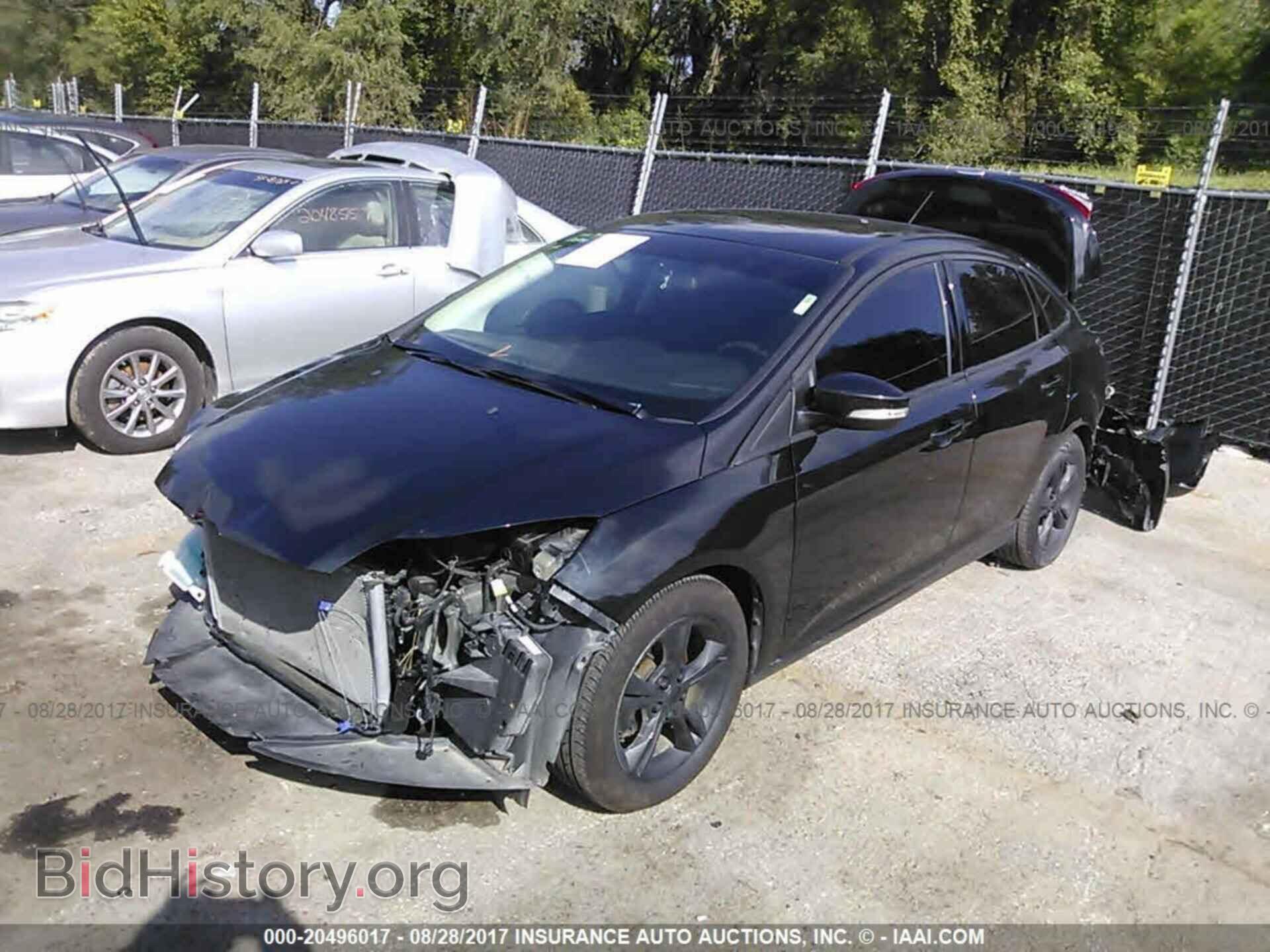 2014 Ford Focus - VIN: 1FADP3F22EL431071 - Photo 2