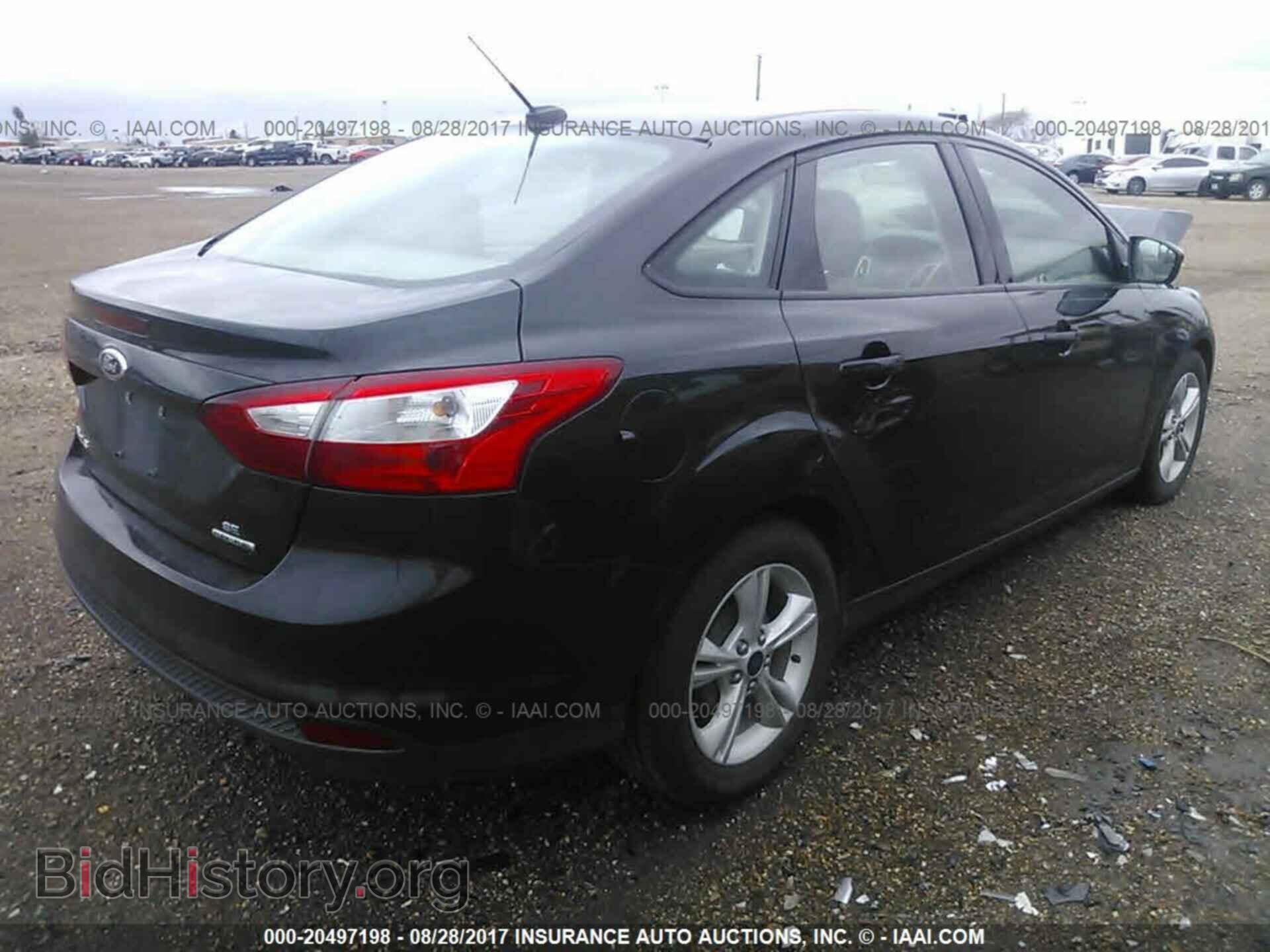 2014 Ford Focus - VIN: 1FADP3F28EL440096 - Photo 4