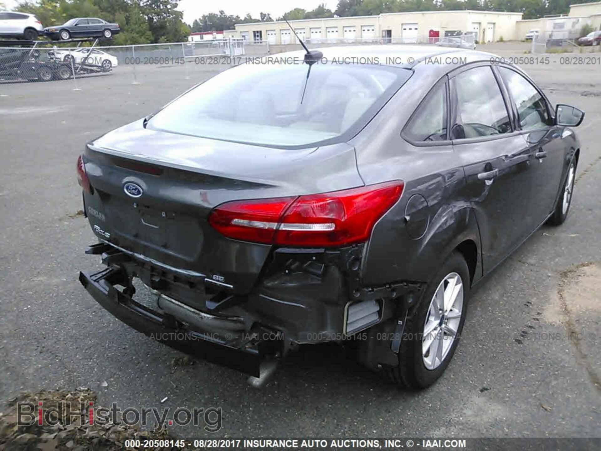2016 Ford Focus - VIN: 1FADP3F23GL250449 - Photo 4