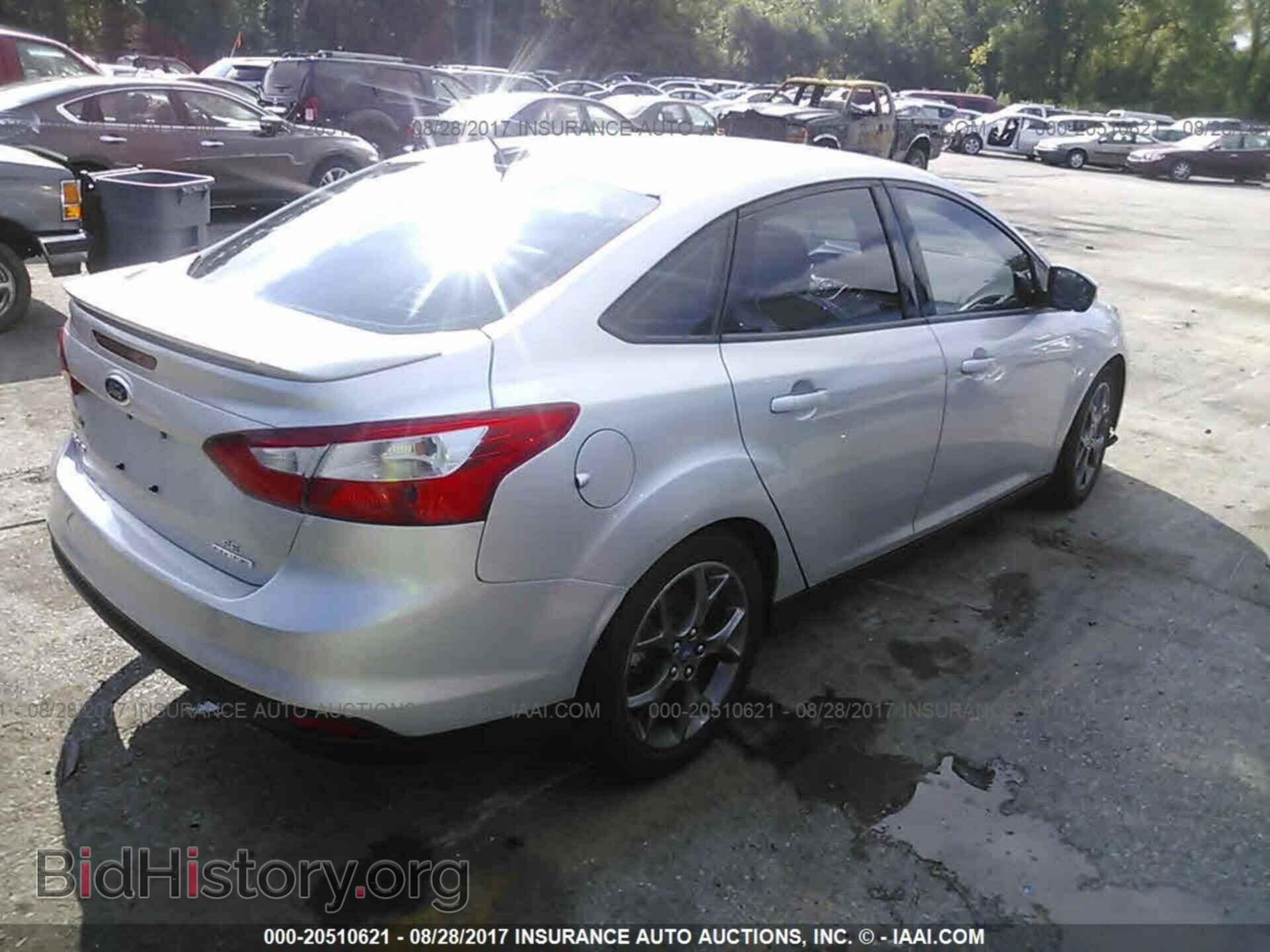 2013 Ford Focus - VIN: 1FADP3F2XDL291351 - Photo 4