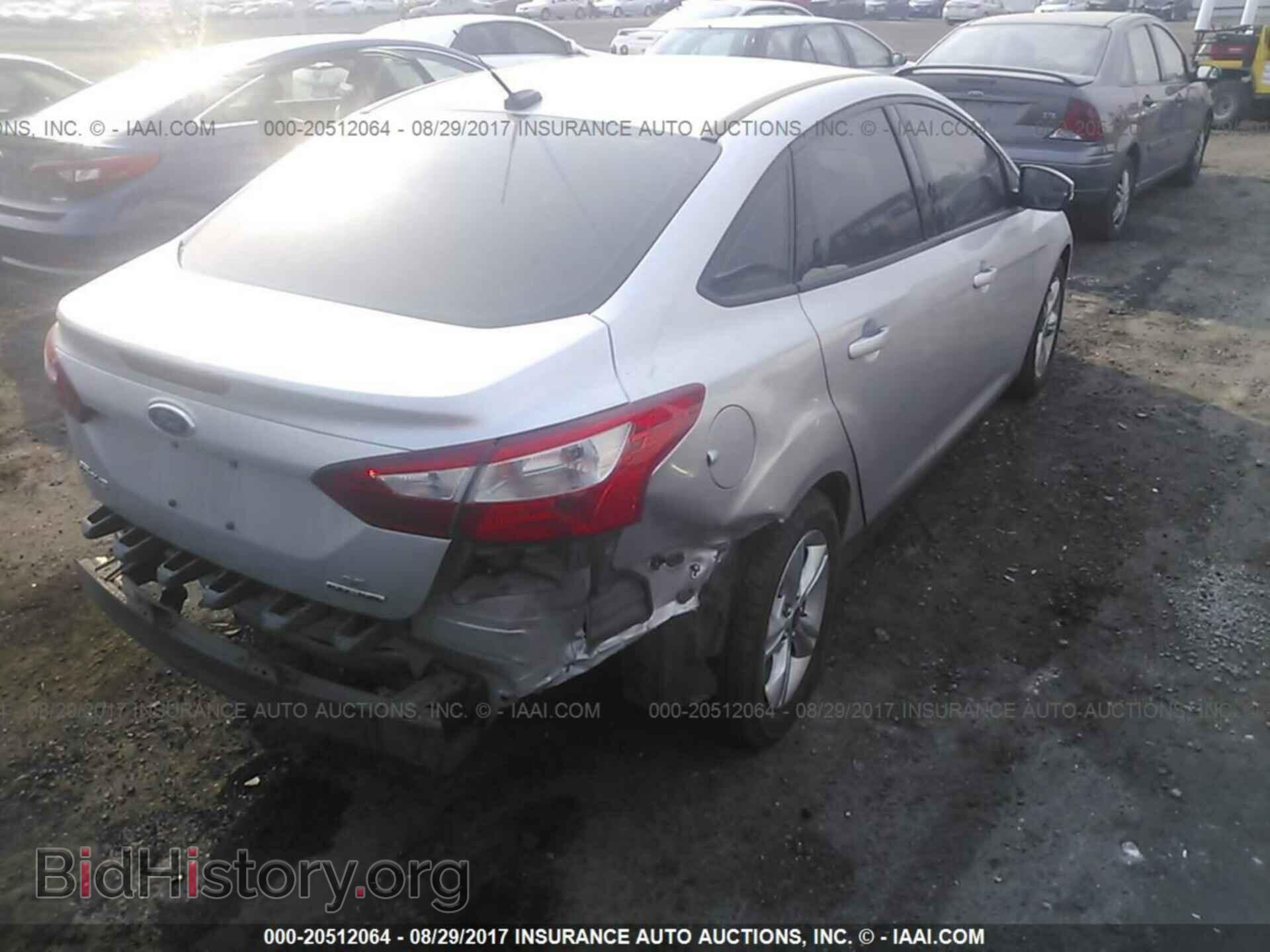2013 Ford Focus - VIN: 1FADP3F22DL382825 - Фото 4