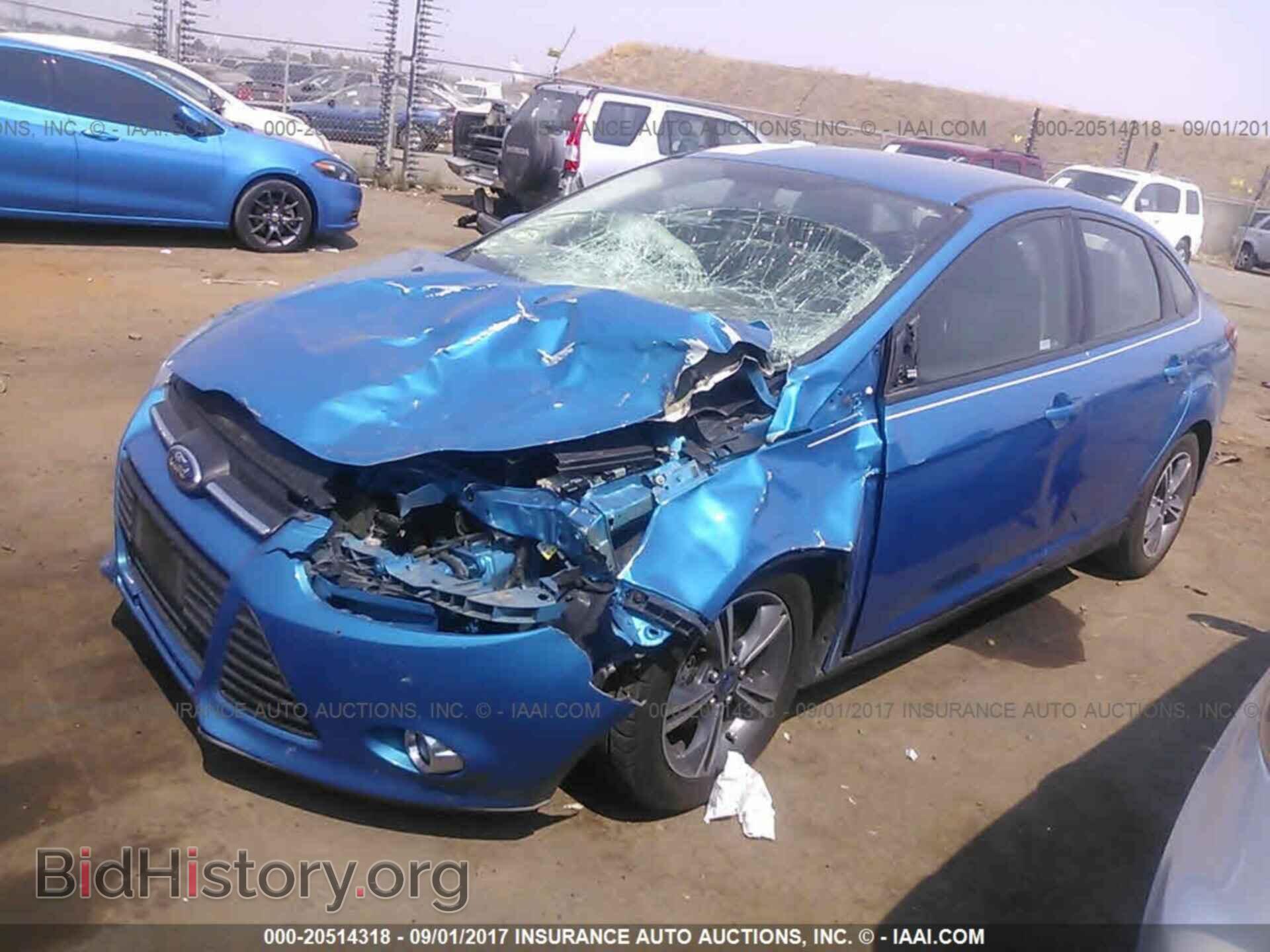 2014 Ford Focus - VIN: 1FADP3F22EL454334 - Фото 2