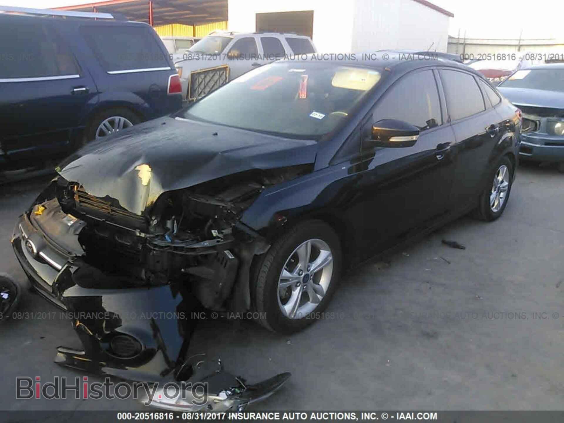 2014 Ford Focus - VIN: 1FADP3F25EL208541 - Фото 2
