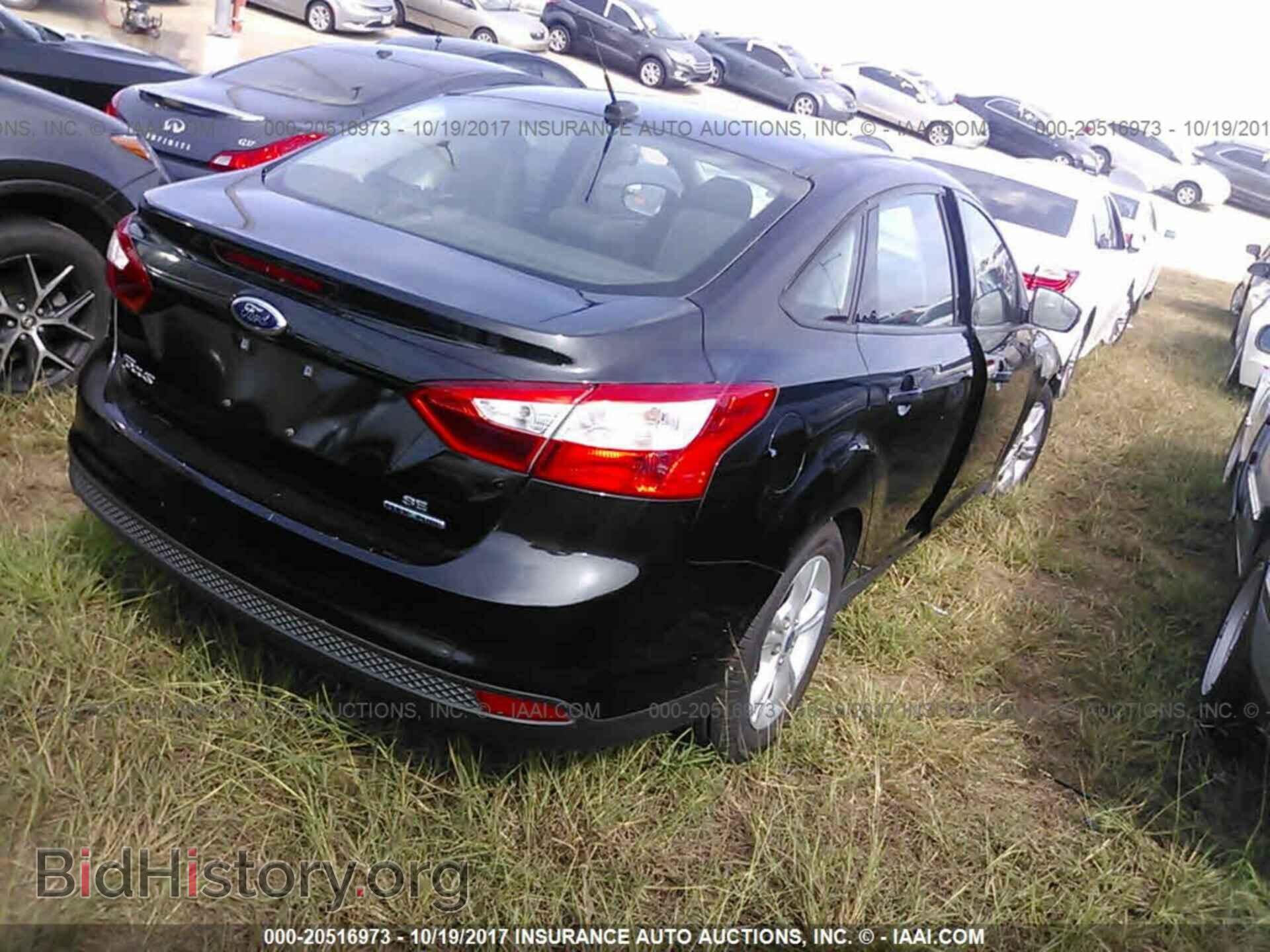 2014 Ford Focus - VIN: 1FADP3F25EL246447 - Фото 4