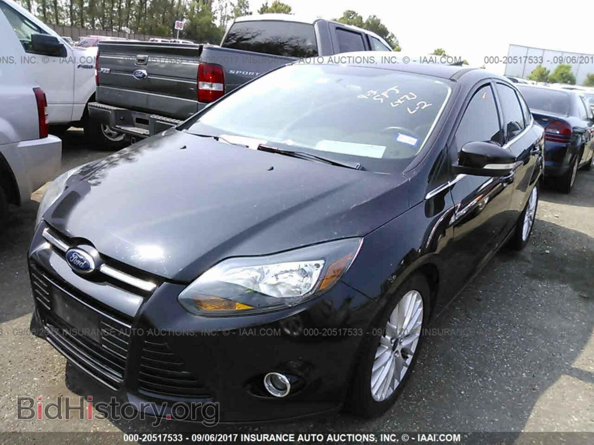 2014 Ford Focus - VIN: 1FADP3J25EL208000 - Фото 2