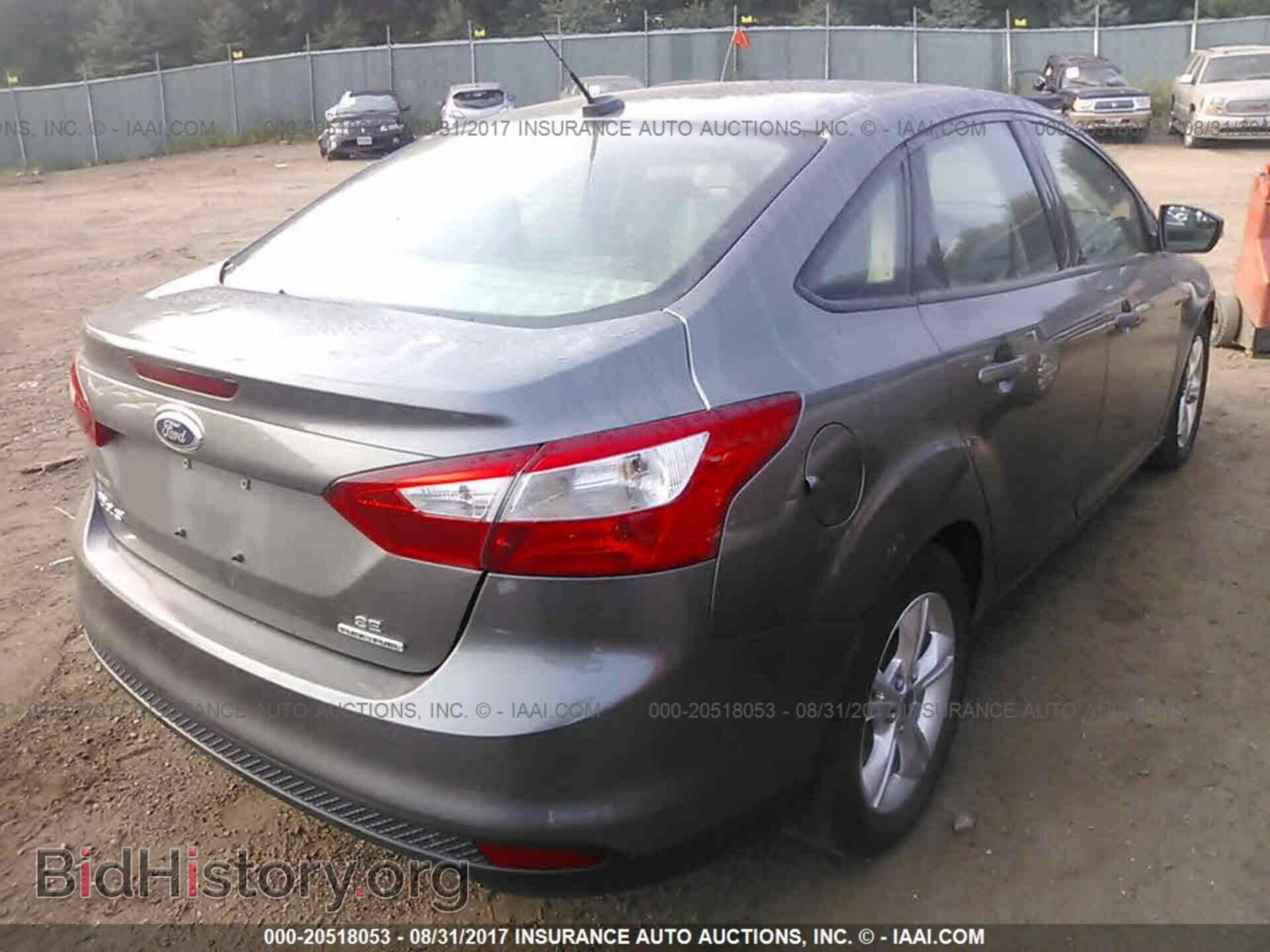 2014 Ford Focus - VIN: 1FADP3F20EL247568 - Photo 4