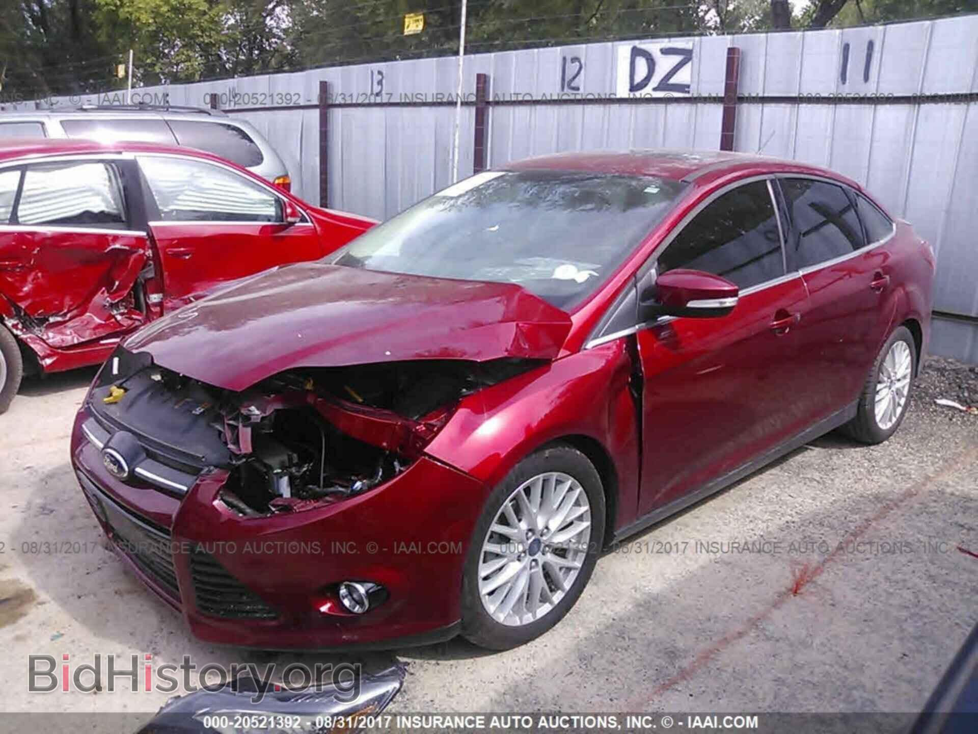 2014 Ford Focus - VIN: 1FADP3J23EL461042 - Фото 2