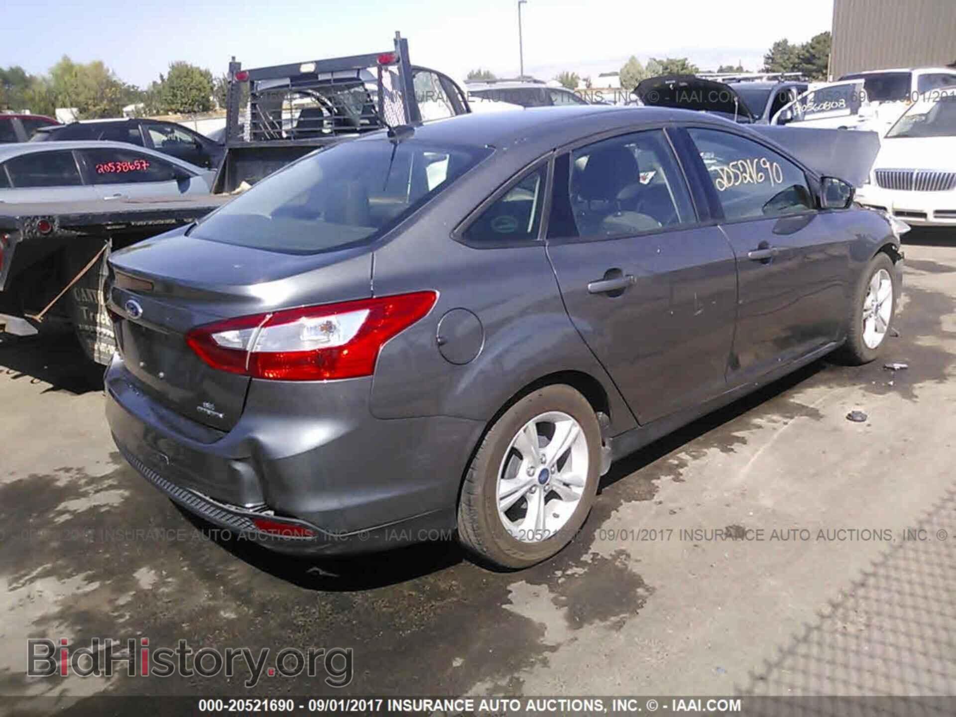 2014 Ford Focus - VIN: 1FADP3F23EL431662 - Фото 4