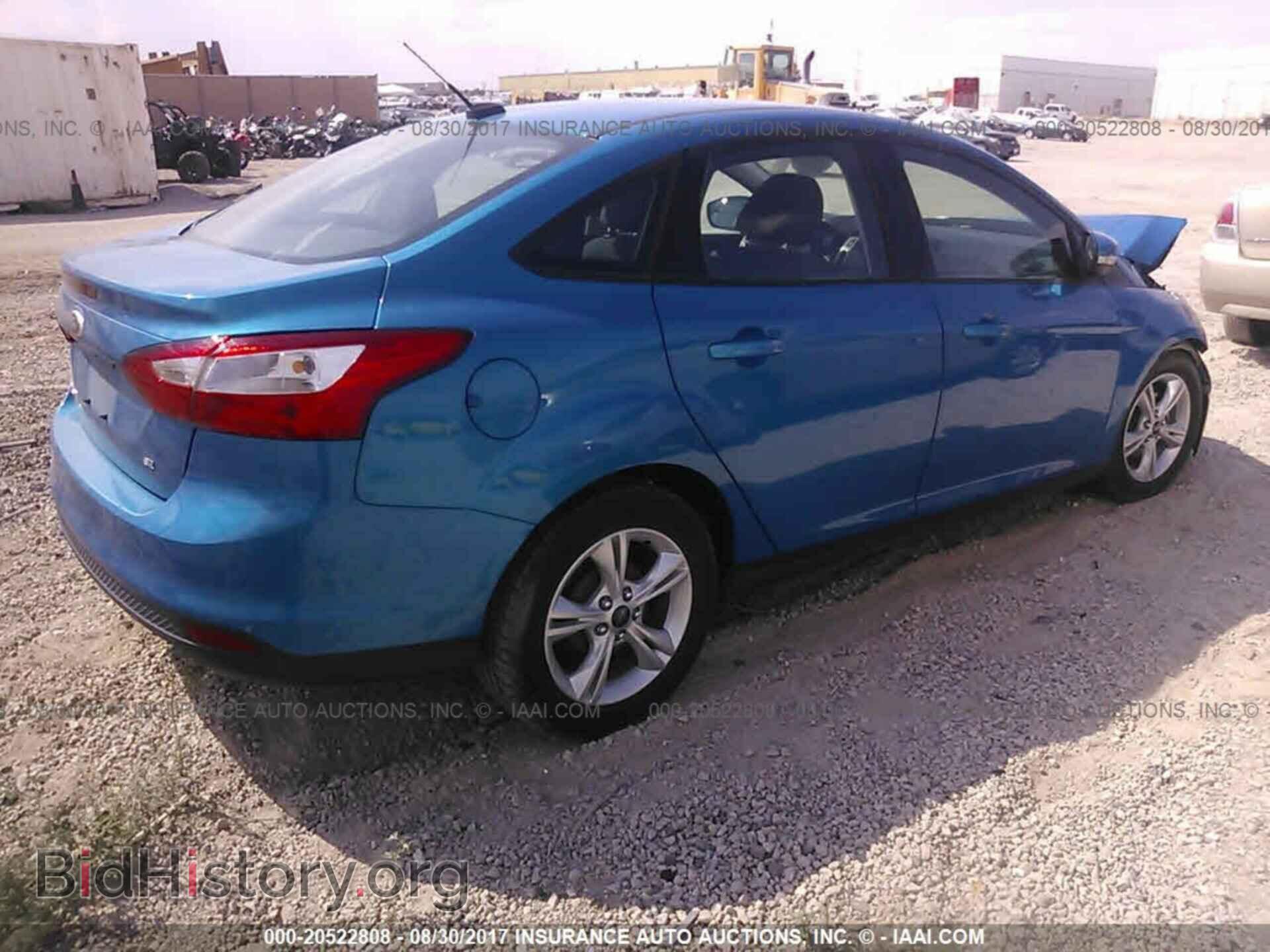 2014 Ford Focus - VIN: 1FADP3F23EL382432 - Фото 4