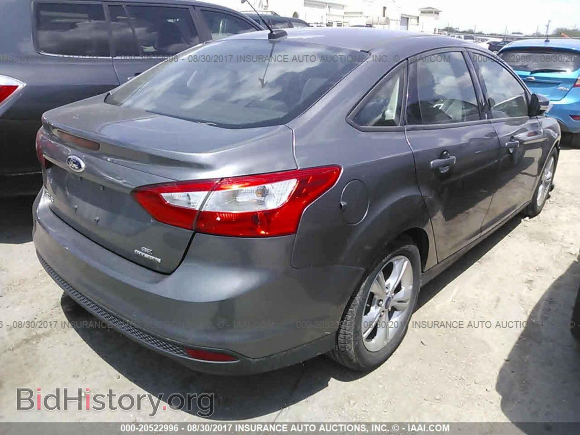 2014 Ford Focus - VIN: 1FADP3F20EL150645 - Фото 4