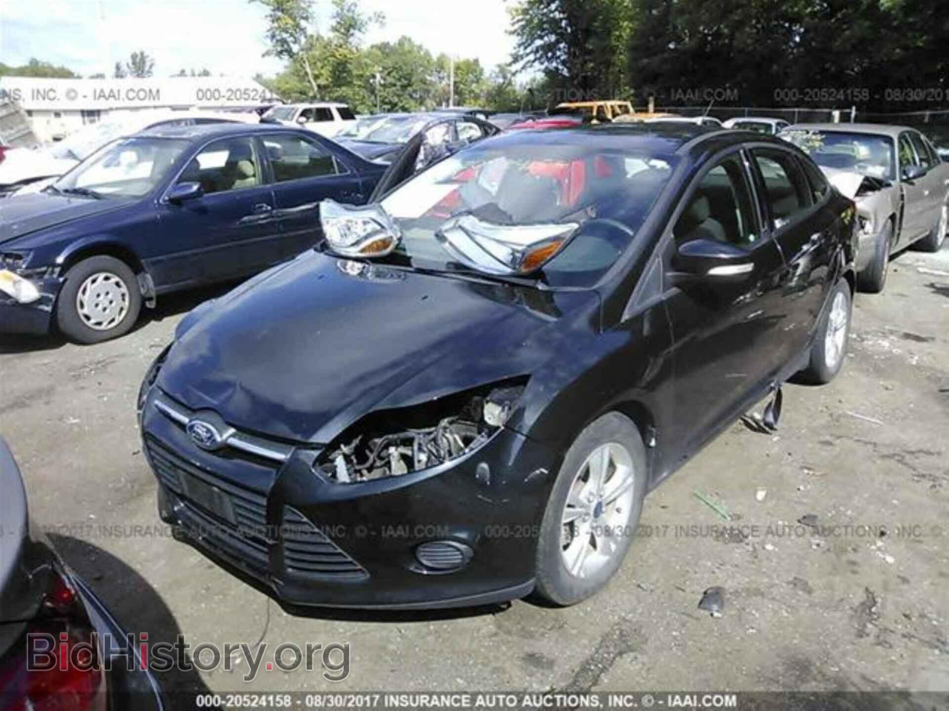 2014 Ford Focus - VIN: 1FADP3F26EL157437 - Photo 2