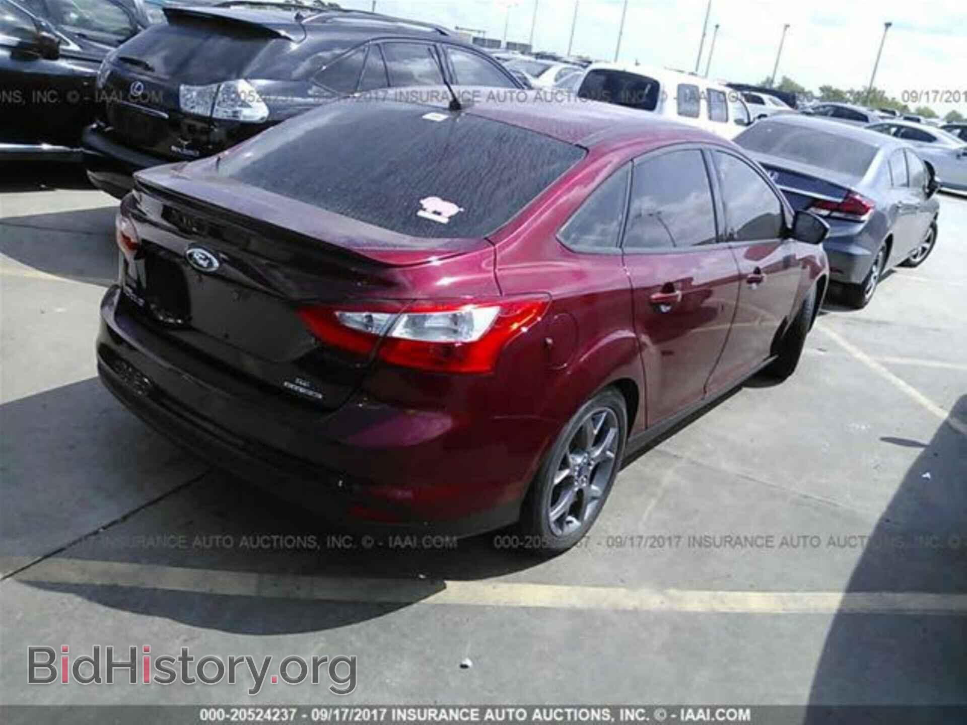 2014 Ford Focus - VIN: 1FADP3F25EL316660 - Фото 4
