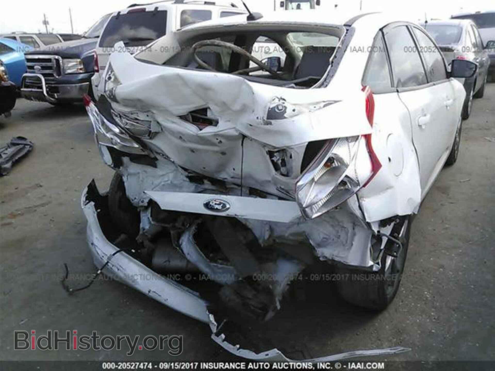 2014 Ford Focus - VIN: 1FADP3F29EL430760 - Фото 4
