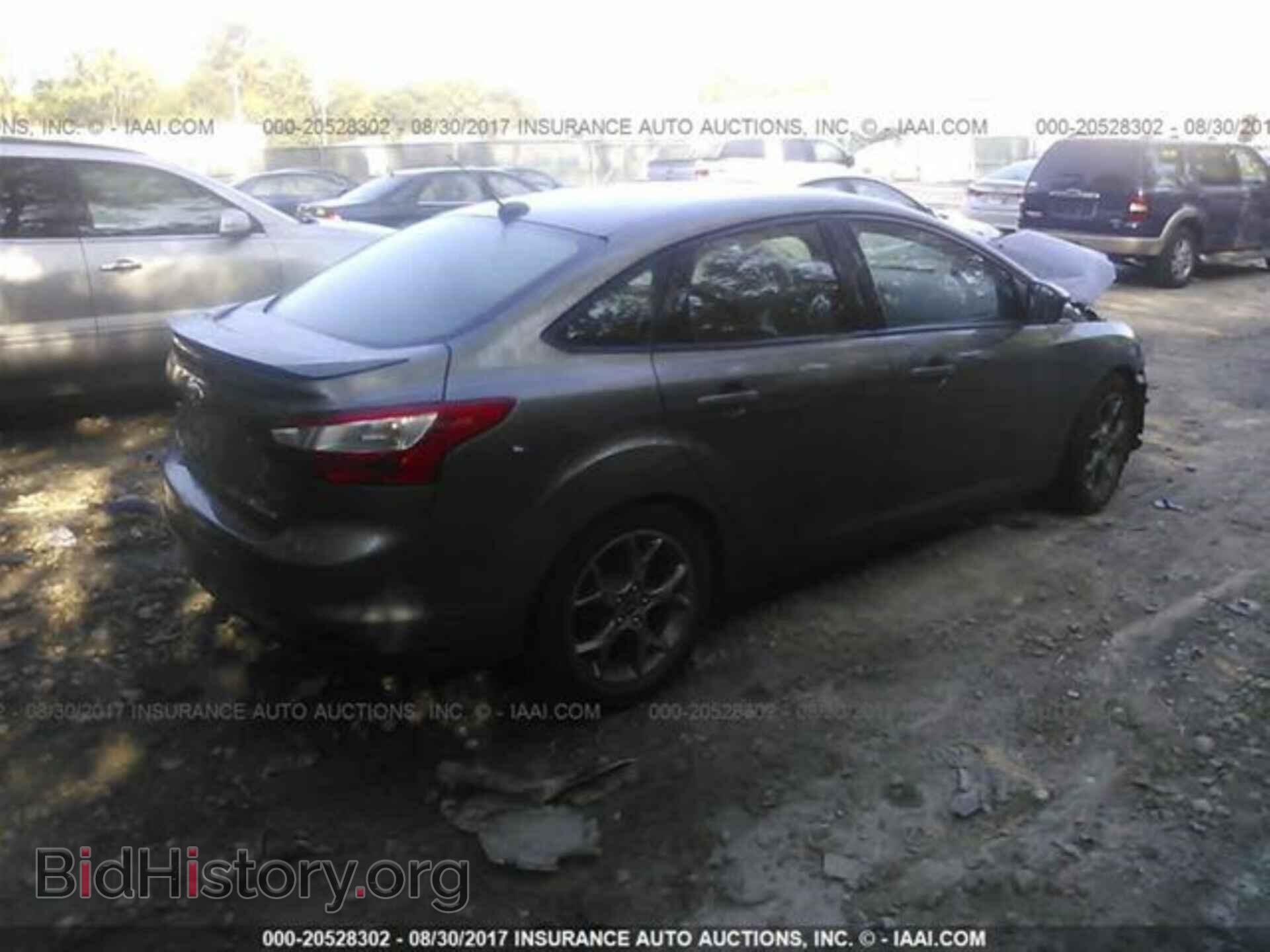2014 Ford Focus - VIN: 1FADP3F25EL116944 - Фото 4