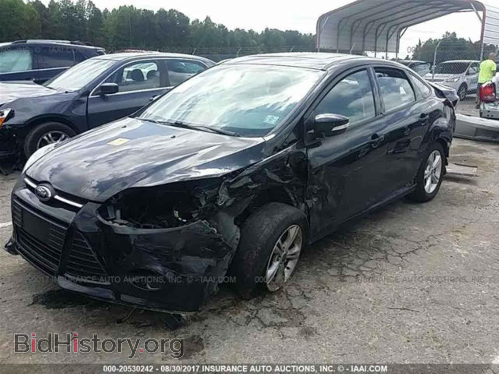 2014 Ford Focus - VIN: 1FADP3F20EL304593 - Фото 2