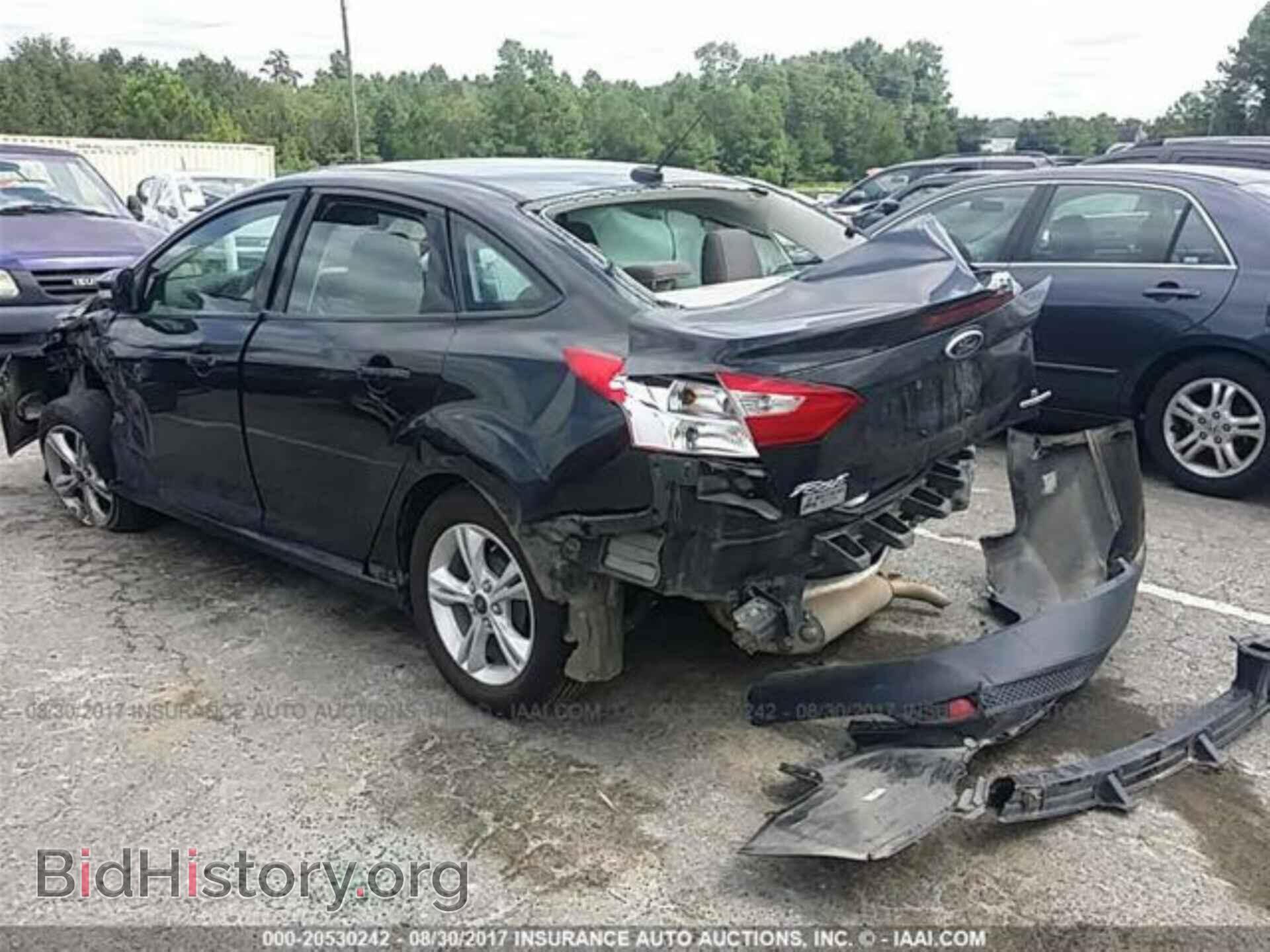 2014 Ford Focus - VIN: 1FADP3F20EL304593 - Фото 3