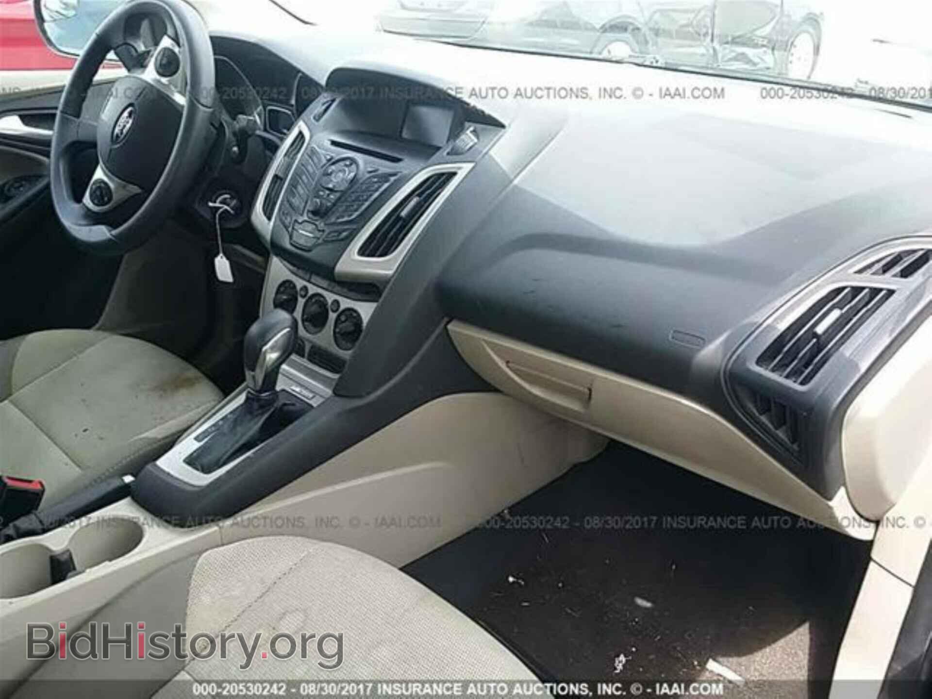 2014 Ford Focus - VIN: 1FADP3F20EL304593 - Фото 5