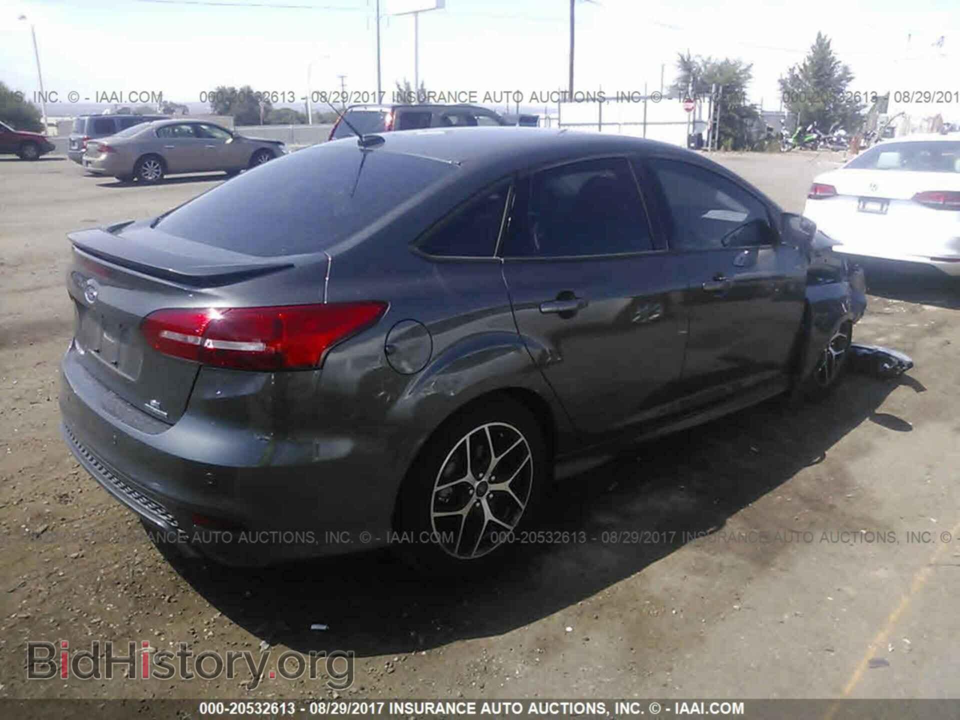 2015 Ford Focus - VIN: 1FADP3F21FL361483 - Photo 4