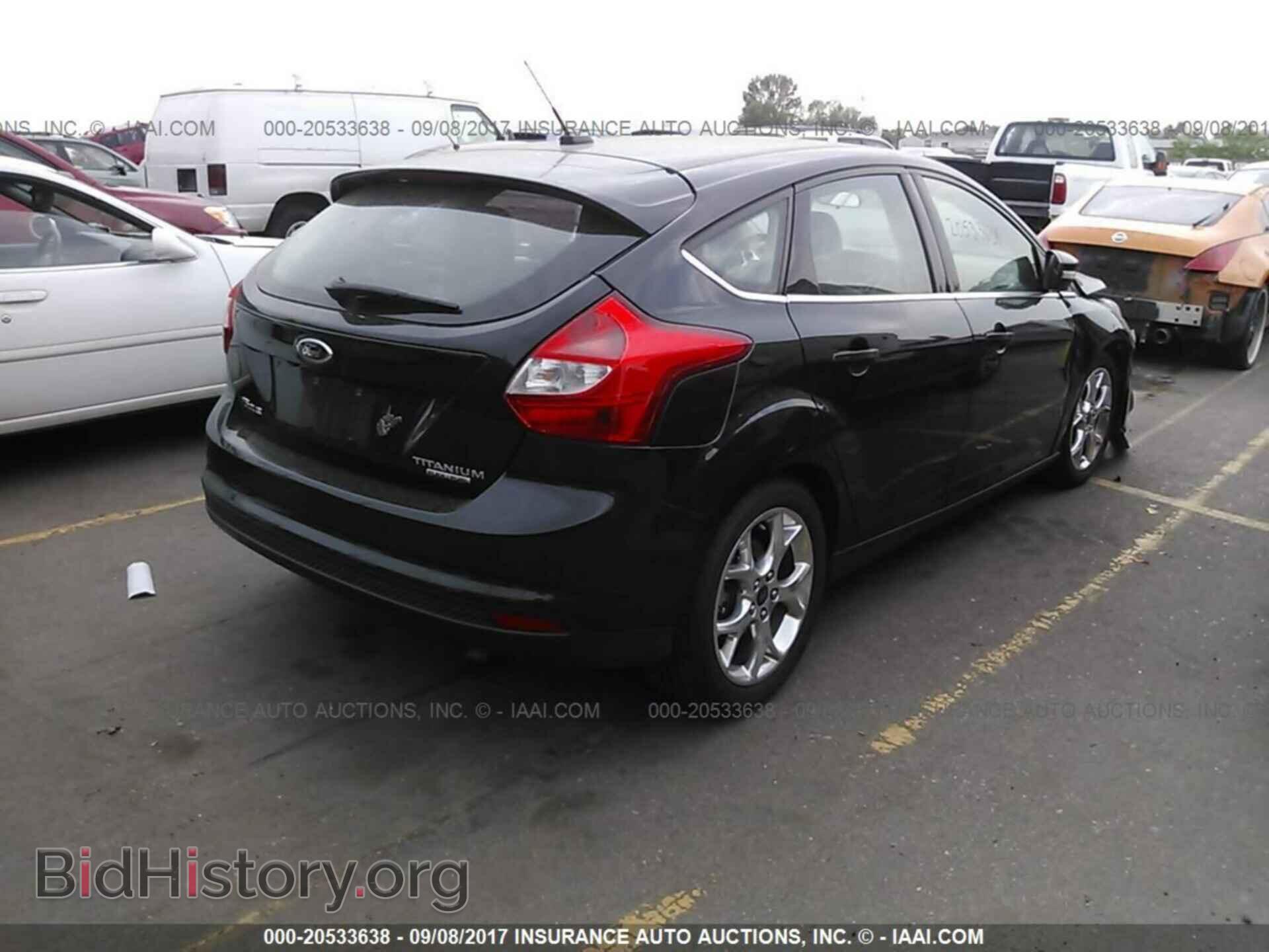 2014 Ford Focus - VIN: 1FADP3N28EL303449 - Фото 4