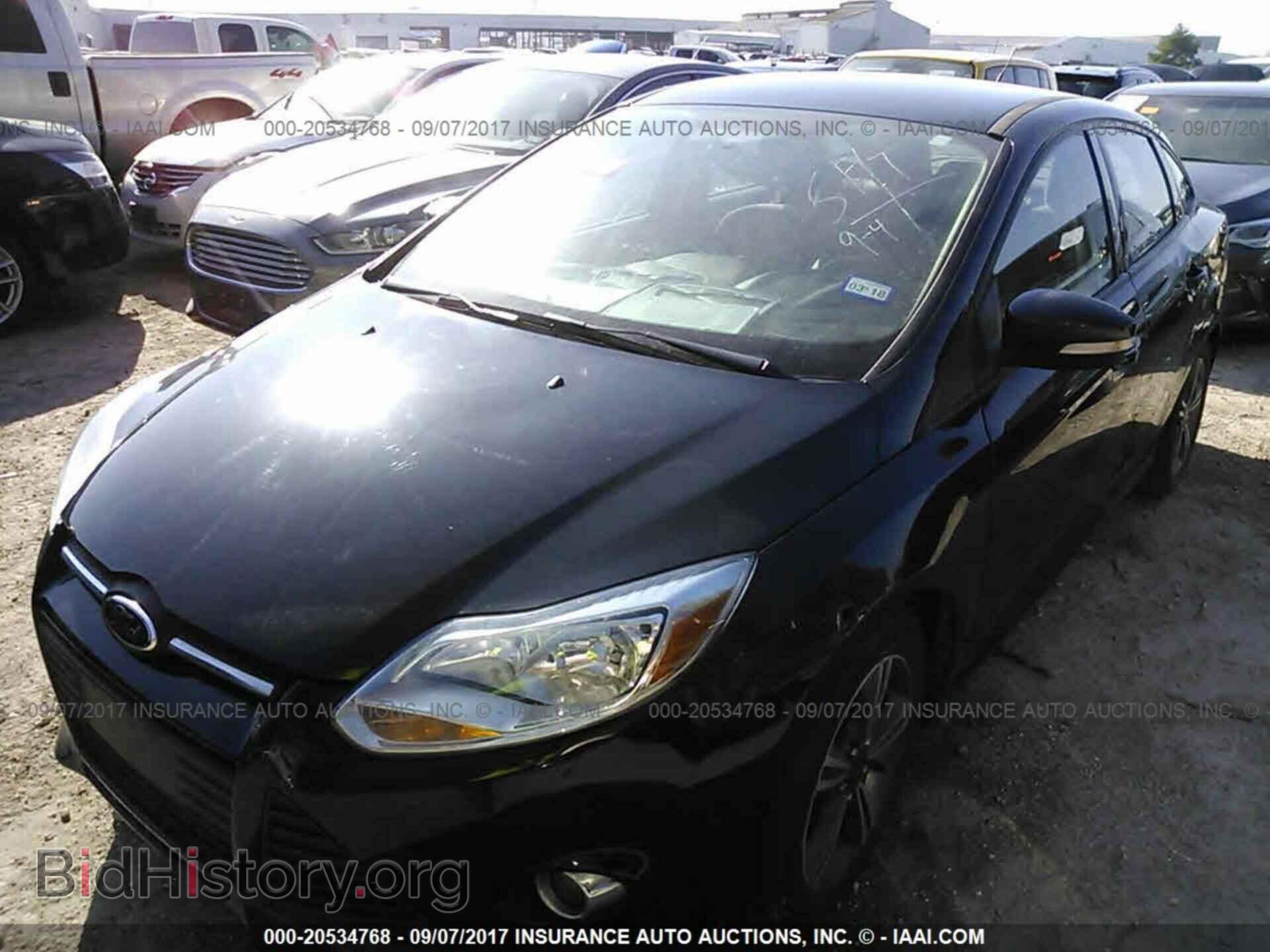 2014 Ford Focus - VIN: 1FADP3F2XEL270405 - Фото 2
