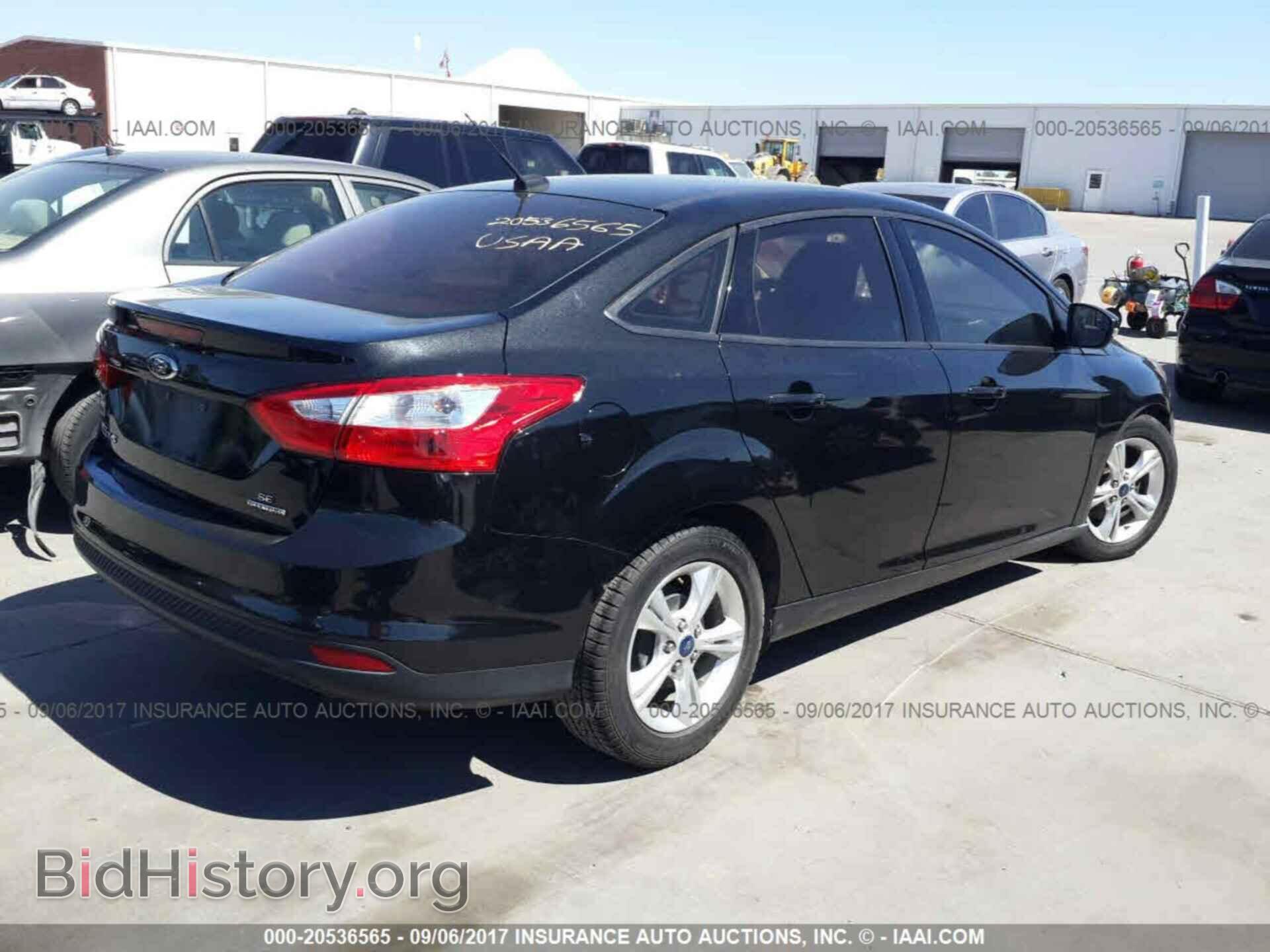 2014 Ford Focus - VIN: 1FADP3F25EL236128 - Photo 4