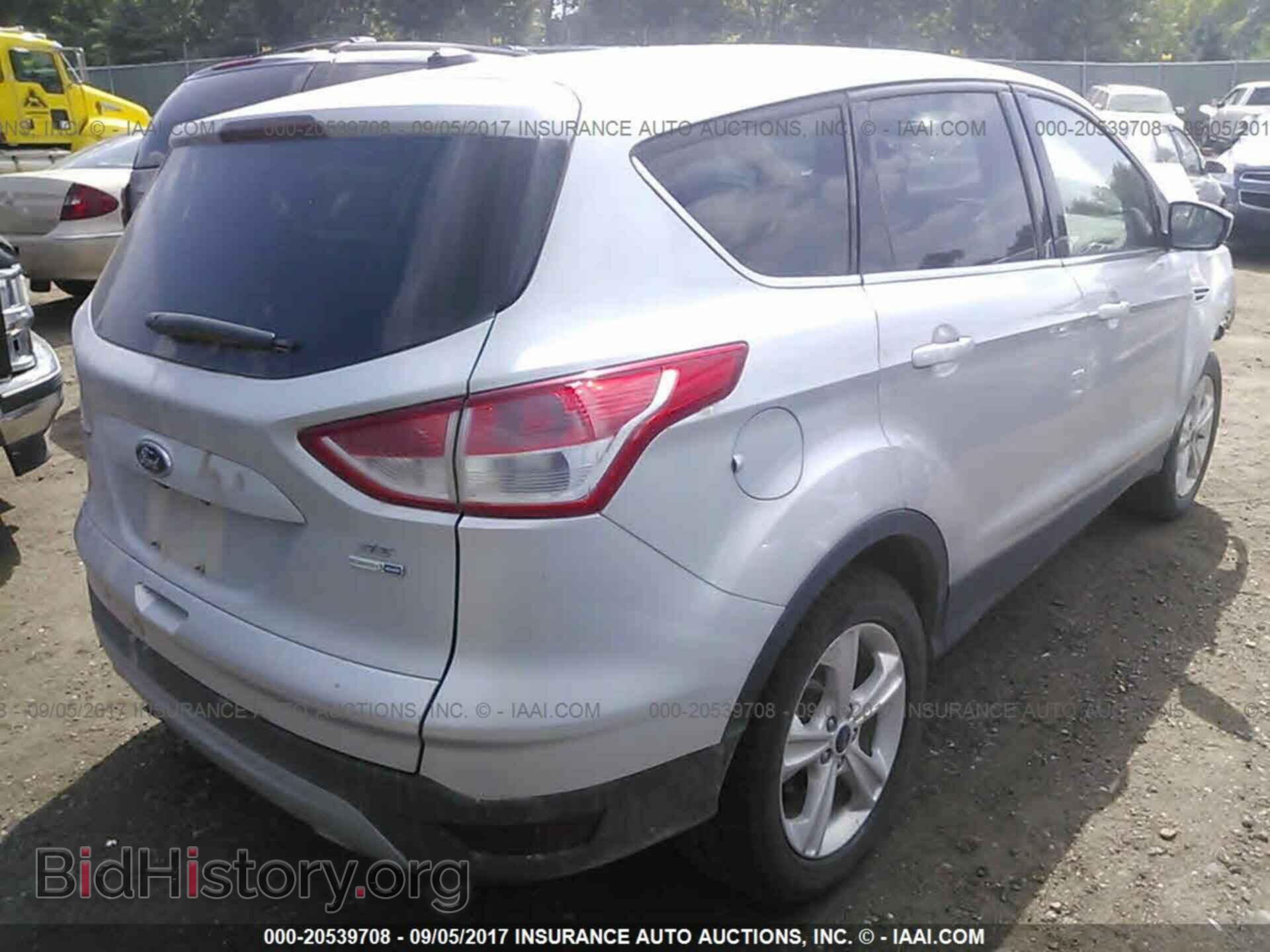 2014 Ford Escape - VIN: 1FMCU9GX3EUD59217 - Photo 4