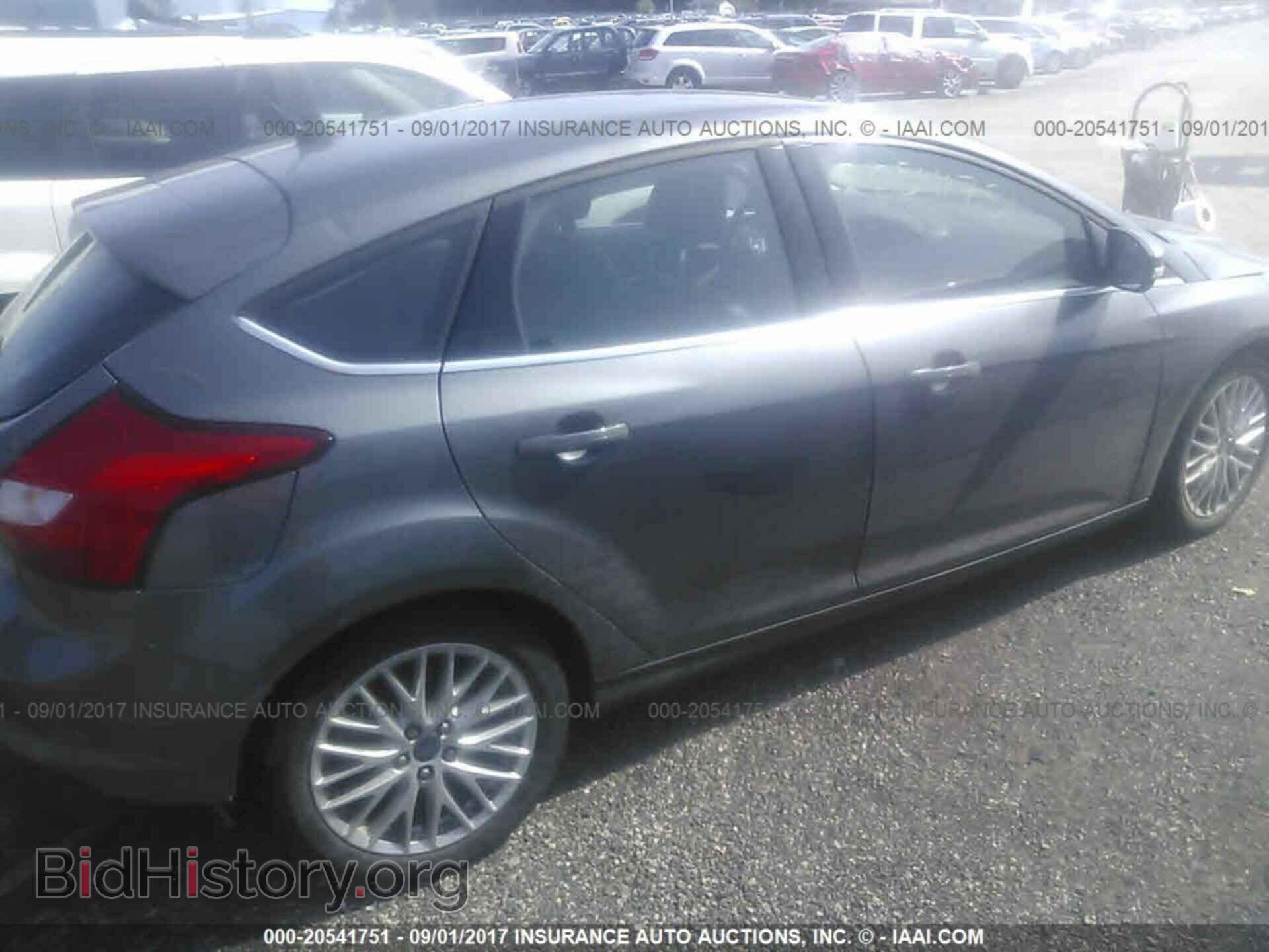 2012 Ford Focus - VIN: 1FAHP3M25CL358411 - Photo 4
