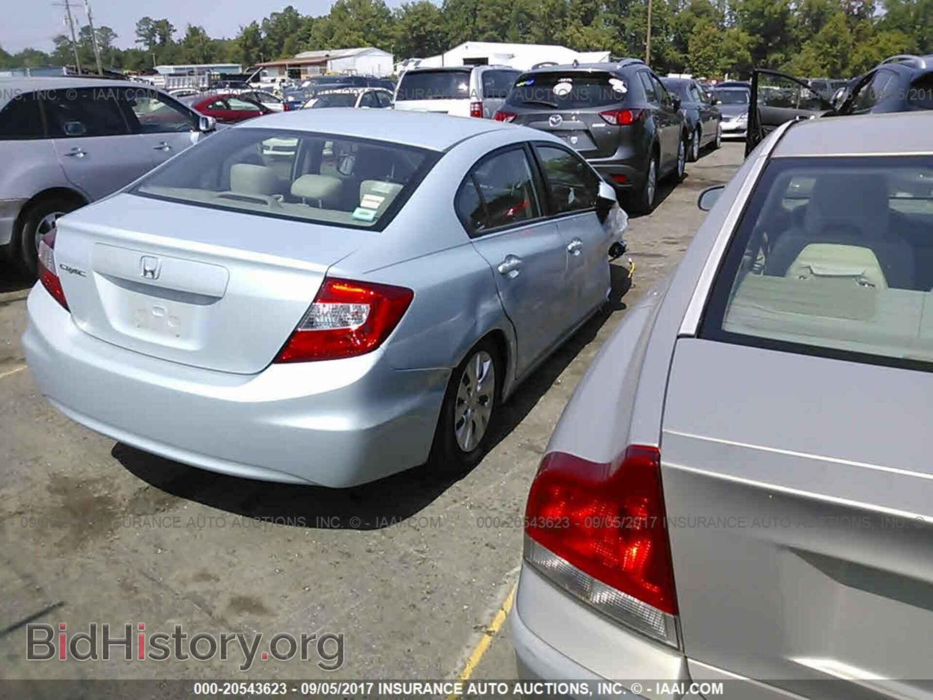 2012 Honda Civic - VIN: 2HGFB2F54CH525146 - Photo 4