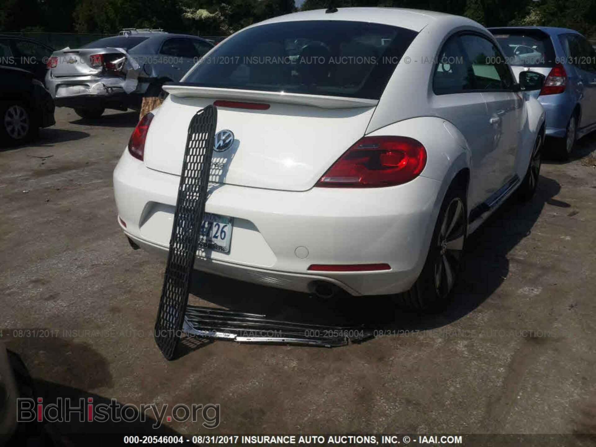 2012 Volkswagen Beetle - VIN: 3VWVA7ATXCM622463 - Фото 4