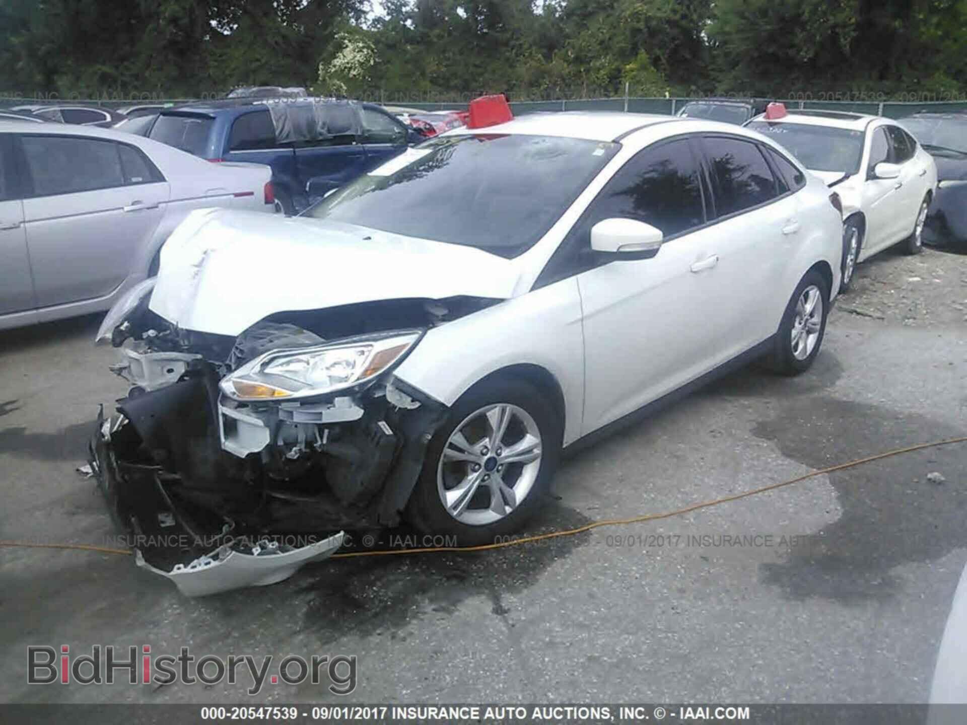 2014 Ford Focus - VIN: 1FADP3F22EL437372 - Photo 2