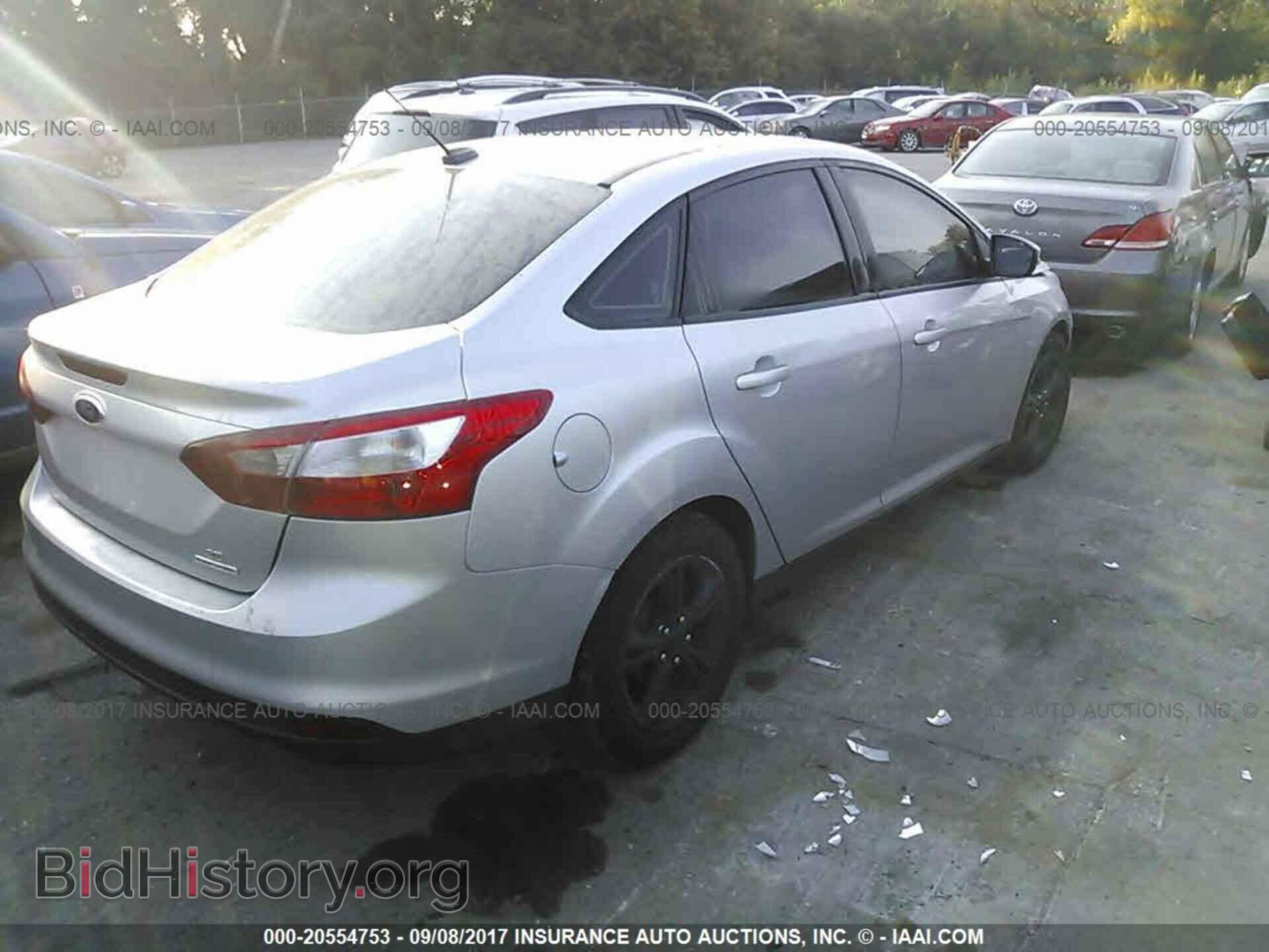 2014 Ford Focus - VIN: 1FADP3F21EL196839 - Photo 4