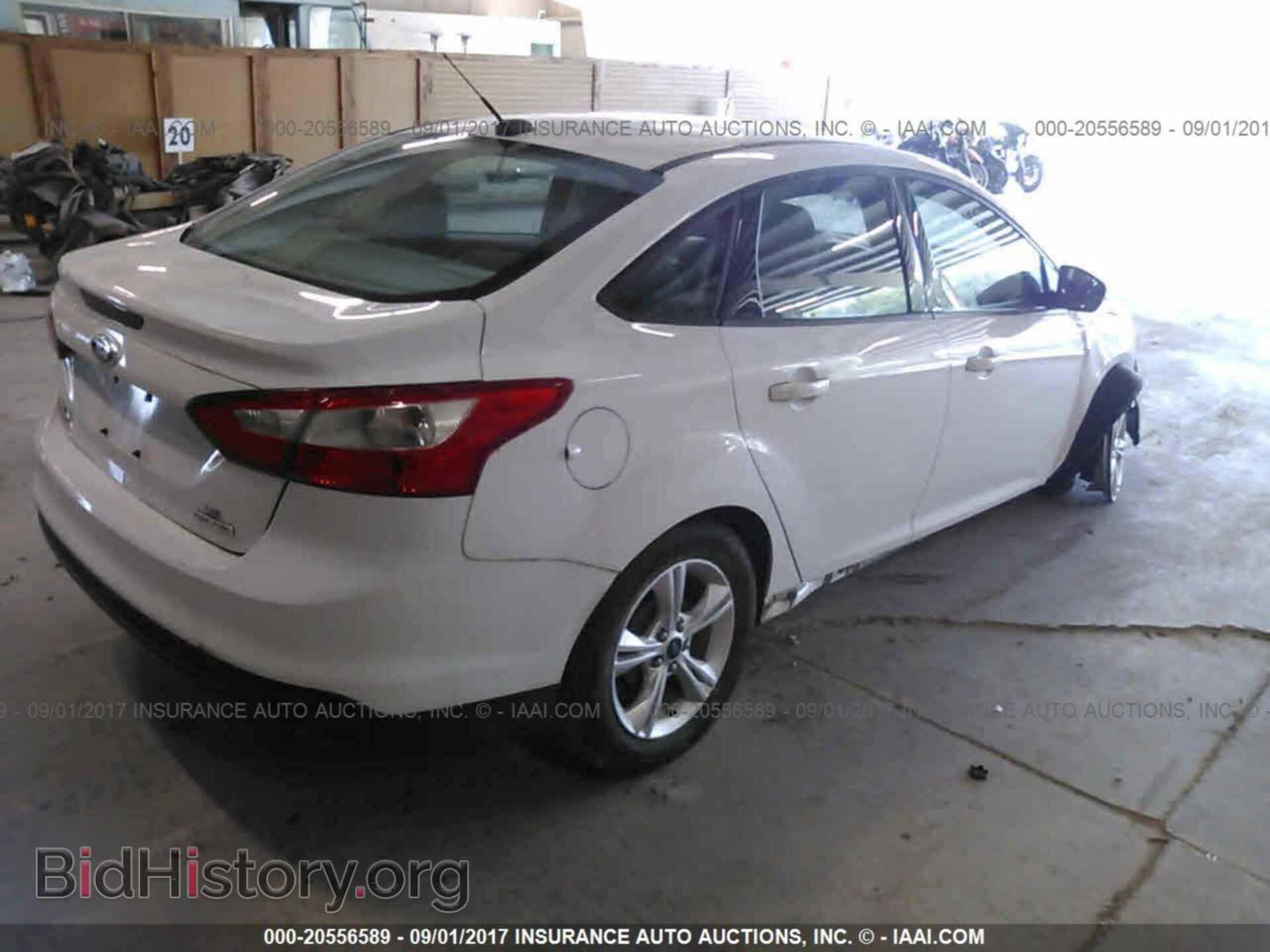 2013 Ford Focus - VIN: 1FADP3F22DL104068 - Фото 4