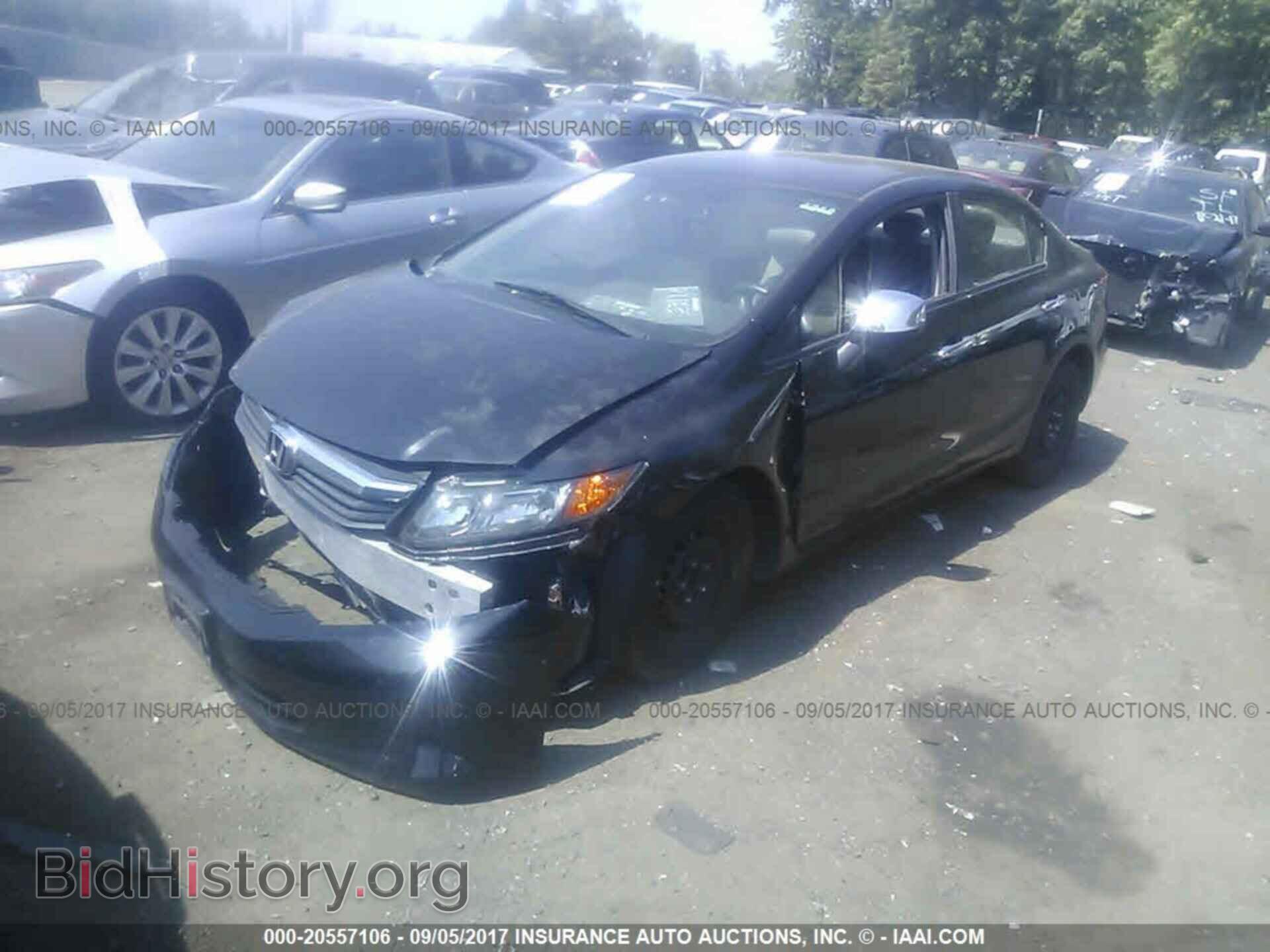 2012 Honda Civic - VIN: 2HGFB2F57CH599483 - Photo 2