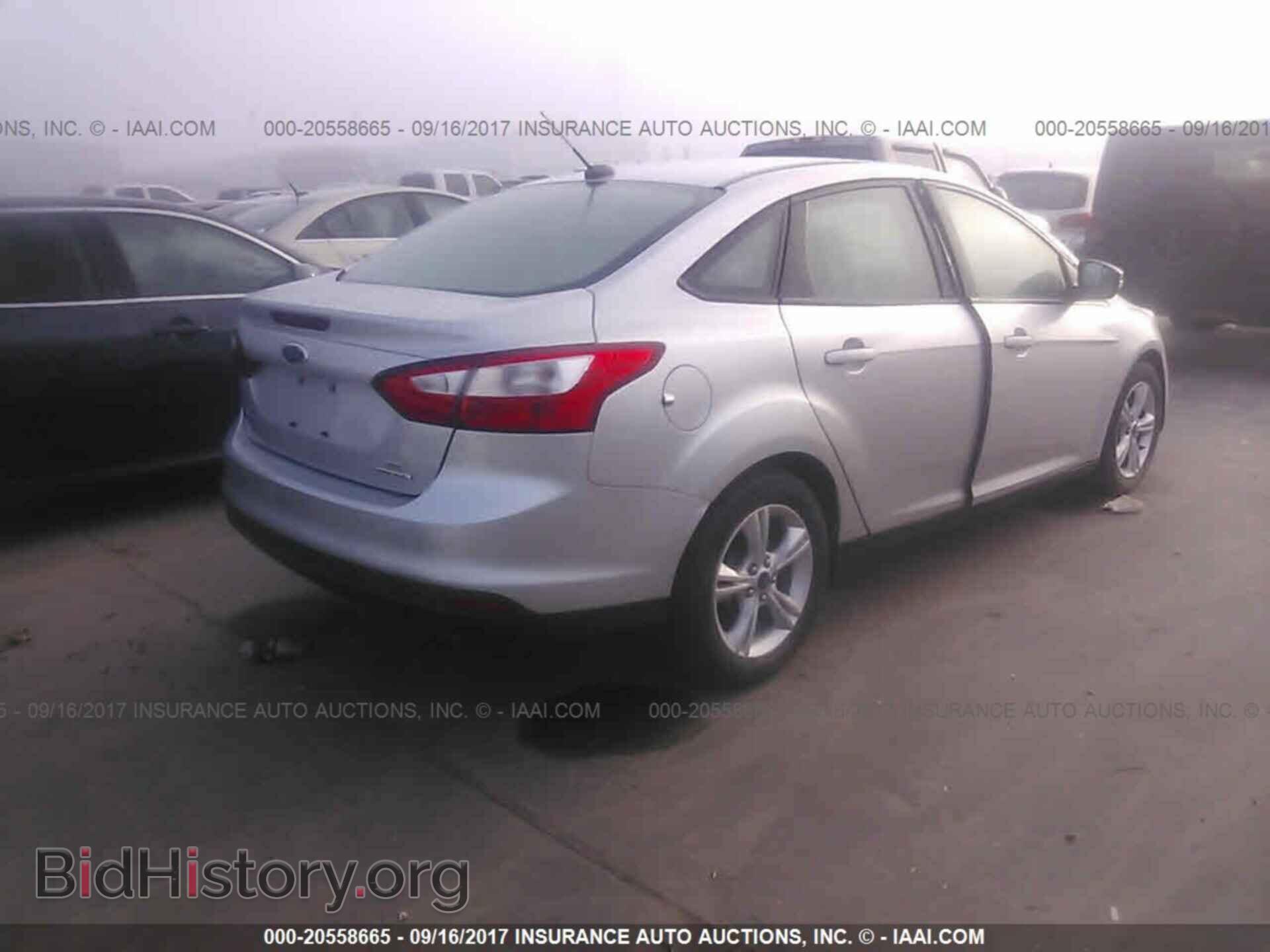 2013 Ford Focus - VIN: 1FADP3F2XDL318807 - Photo 4