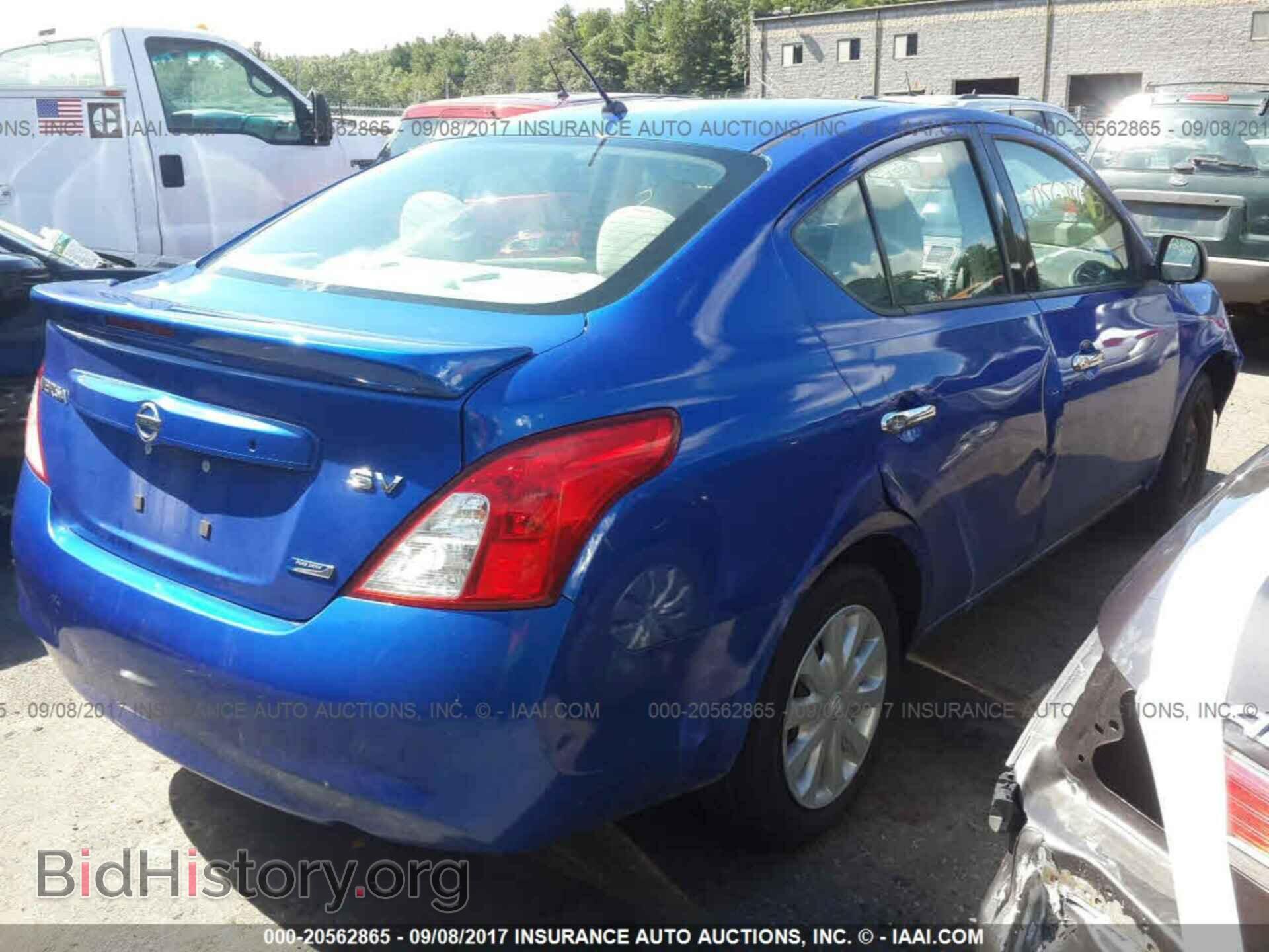 2014 Nissan Versa - VIN: 3N1CN7AP1EL804999 - Фото 4