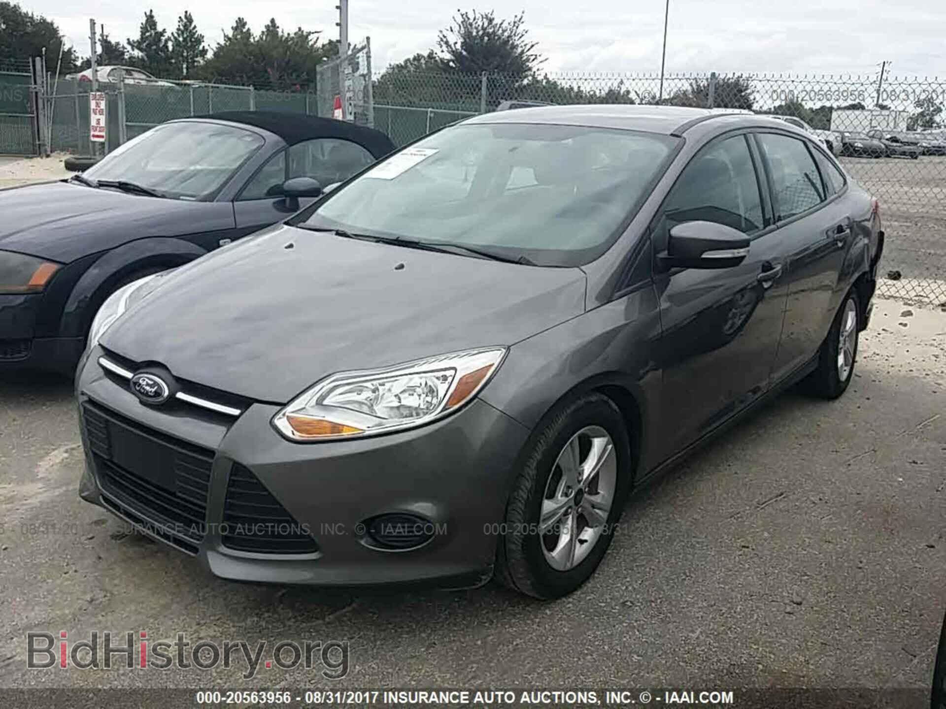 2014 Ford Focus - VIN: 1FADP3F29EL320369 - Фото 2