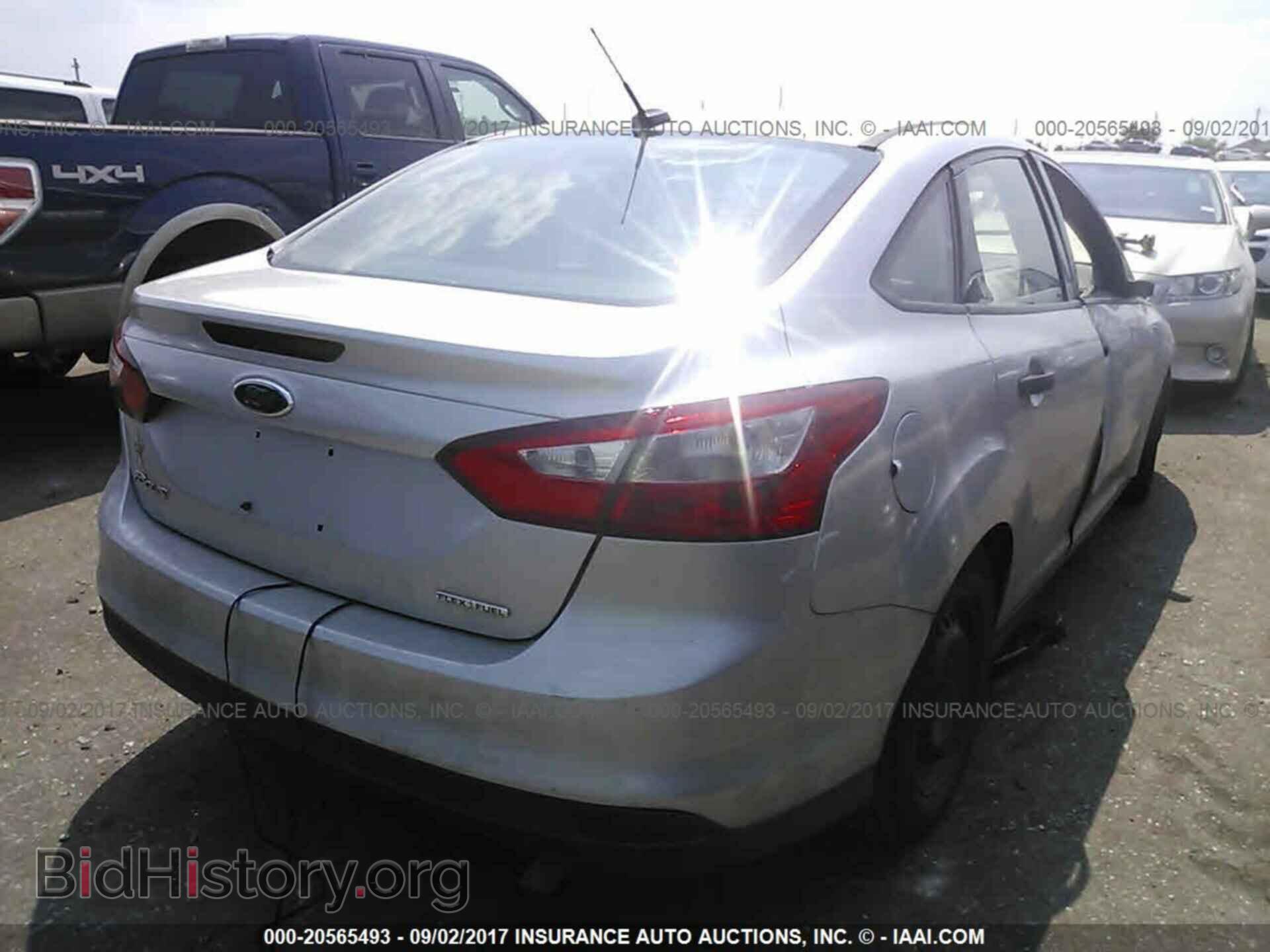 2014 Ford Focus - VIN: 1FADP3E24EL117441 - Фото 4