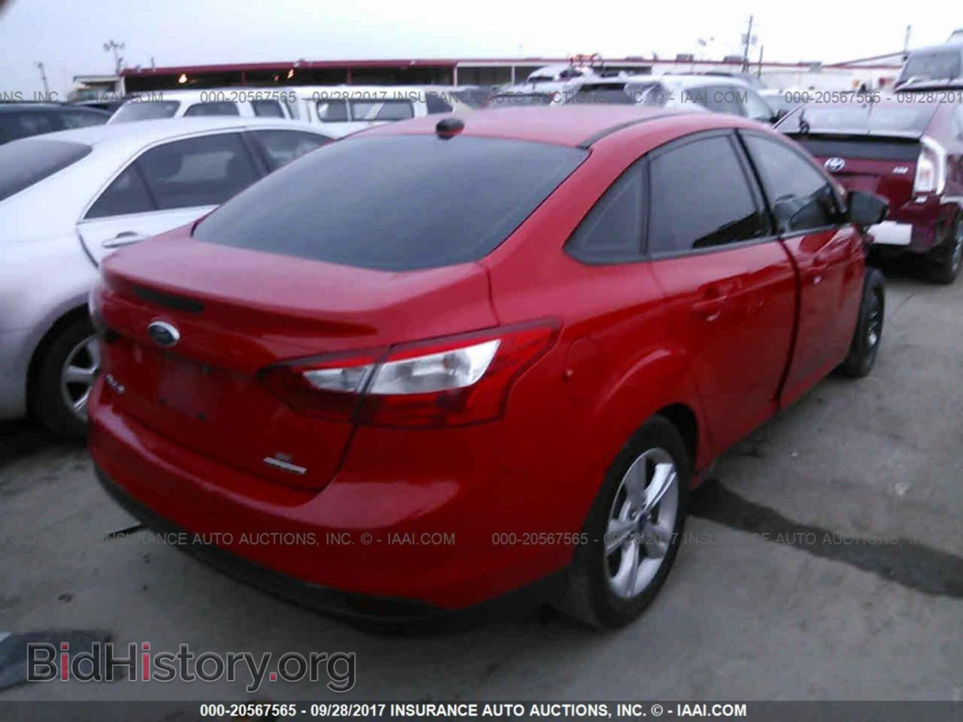 2014 Ford Focus - VIN: 1FADP3F24EL177394 - Photo 4