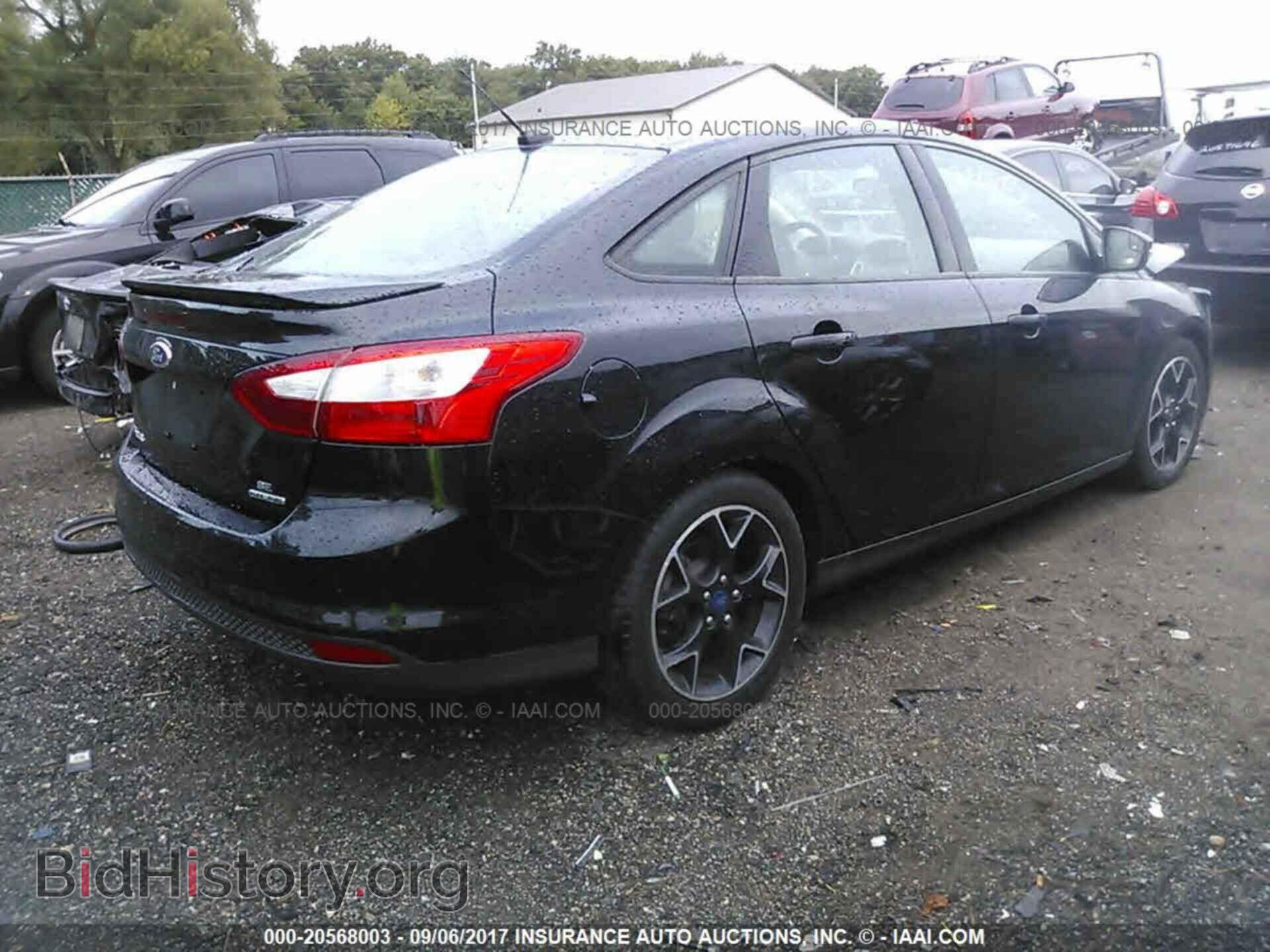 2014 Ford Focus - VIN: 1FADP3F24EL216890 - Фото 4