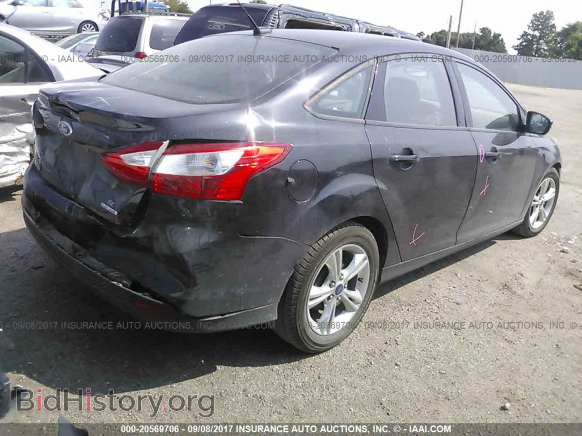 2014 Ford Focus - VIN: 1FADP3F28EL143894 - Фото 4