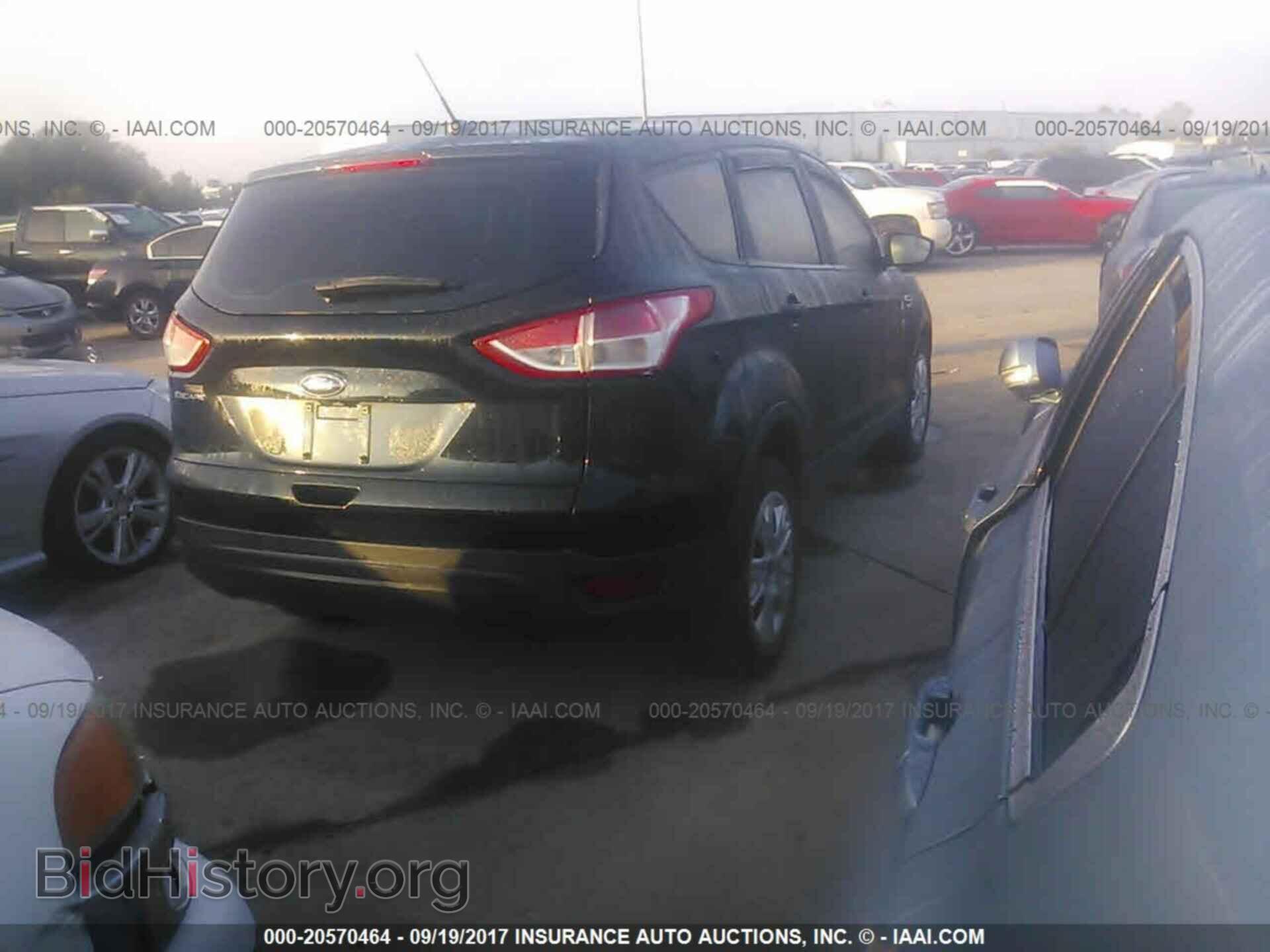 2014 Ford Escape - VIN: 1FMCU0F79EUC84410 - Photo 4