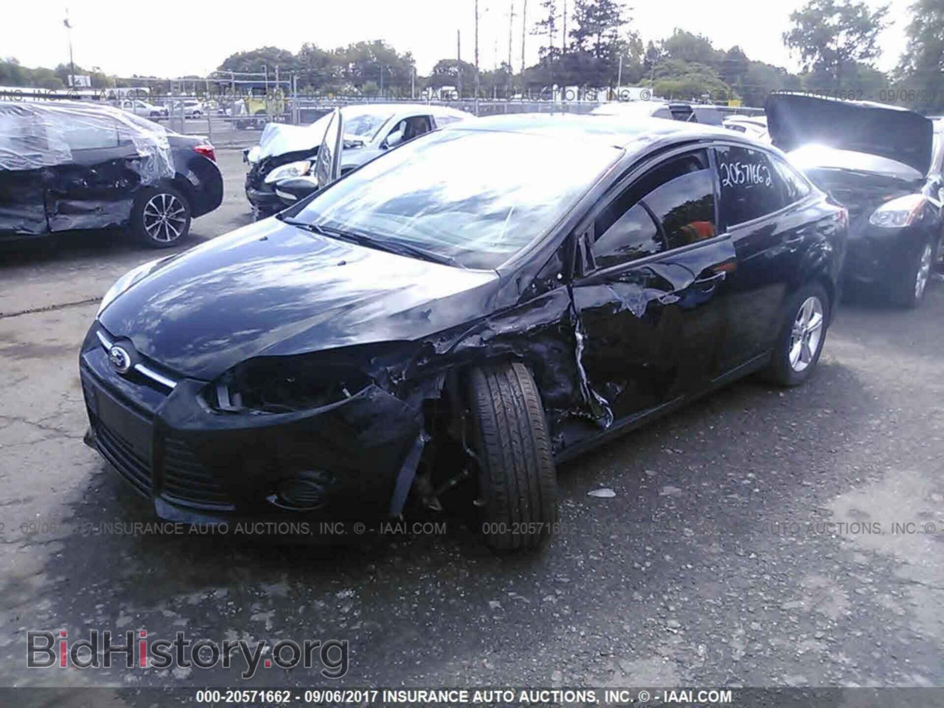 2014 Ford Focus - VIN: 1FADP3F22EL253579 - Фото 2