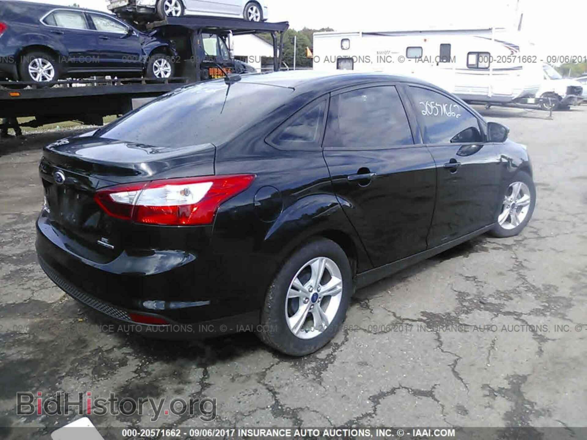 2014 Ford Focus - VIN: 1FADP3F22EL253579 - Фото 4