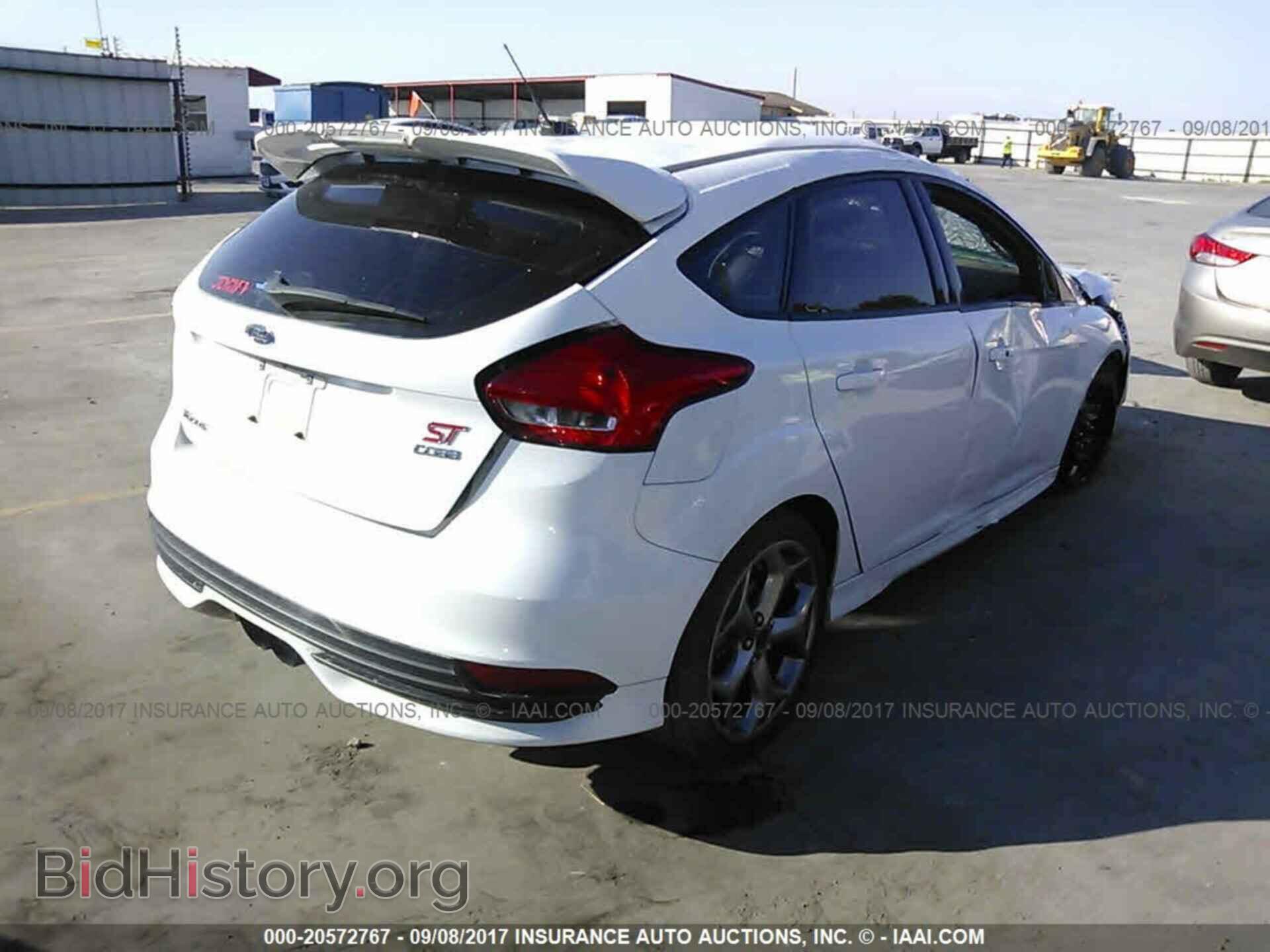 2015 Ford Focus - VIN: 1FADP3L99FL320097 - Photo 4
