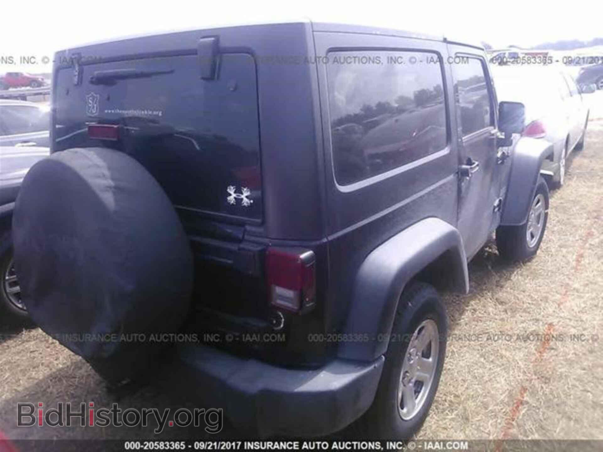 2011 Jeep Wrangler - VIN: 1J4AA2D11BL618052 - Фото 4