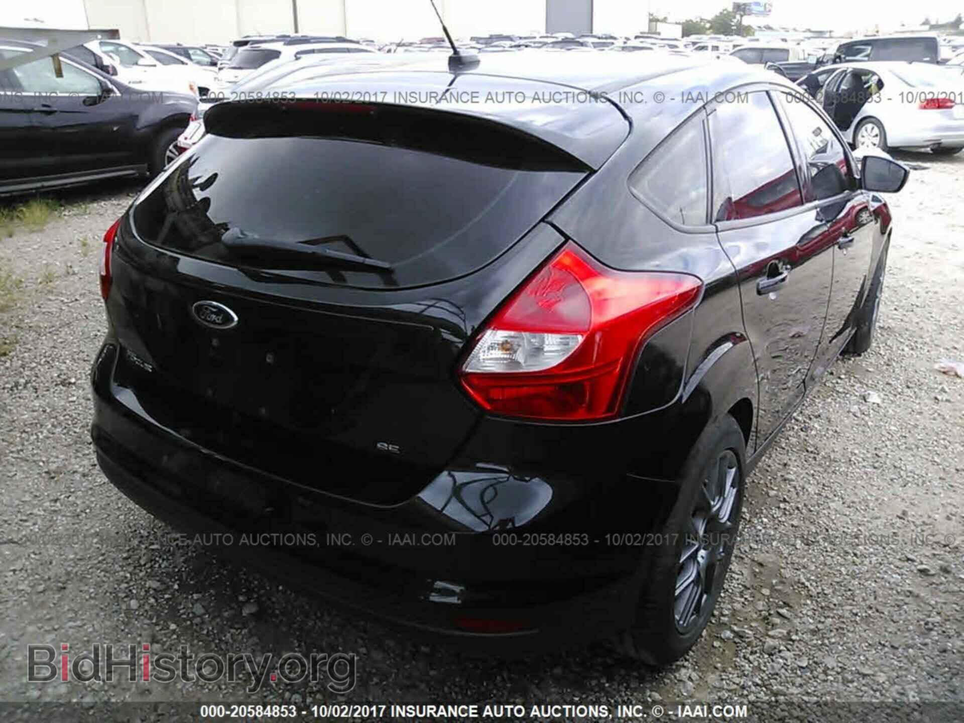 2014 Ford Focus - VIN: 1FADP3K26EL334591 - Photo 4