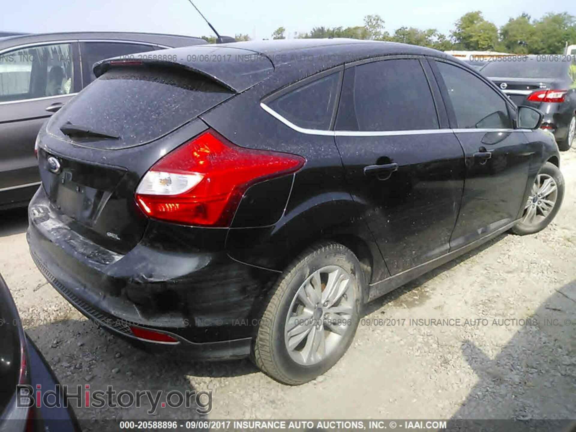 2012 Ford Focus - VIN: 1FAHP3M22CL304483 - Фото 4