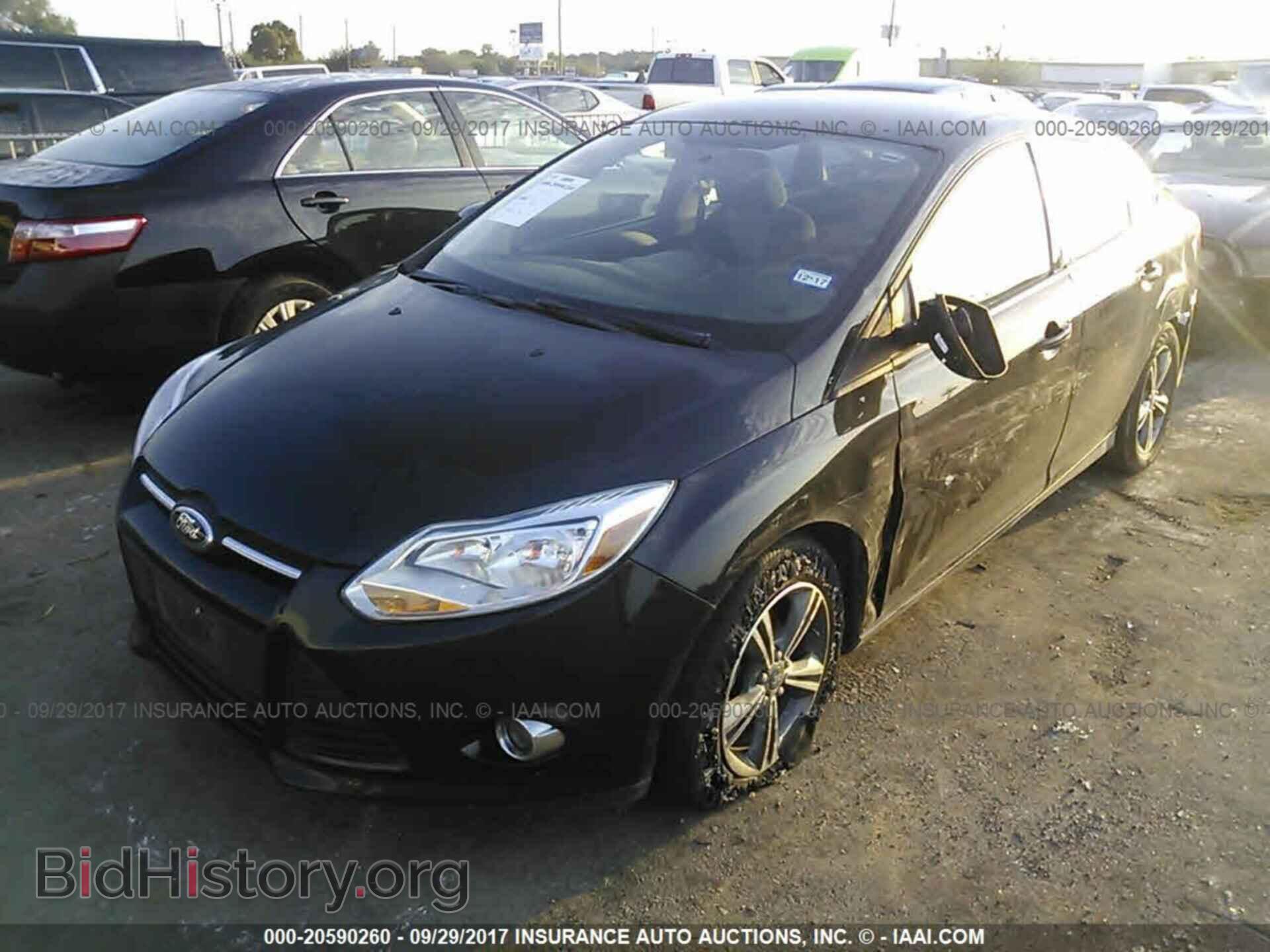2014 Ford Focus - VIN: 1FADP3F29EL412694 - Photo 2